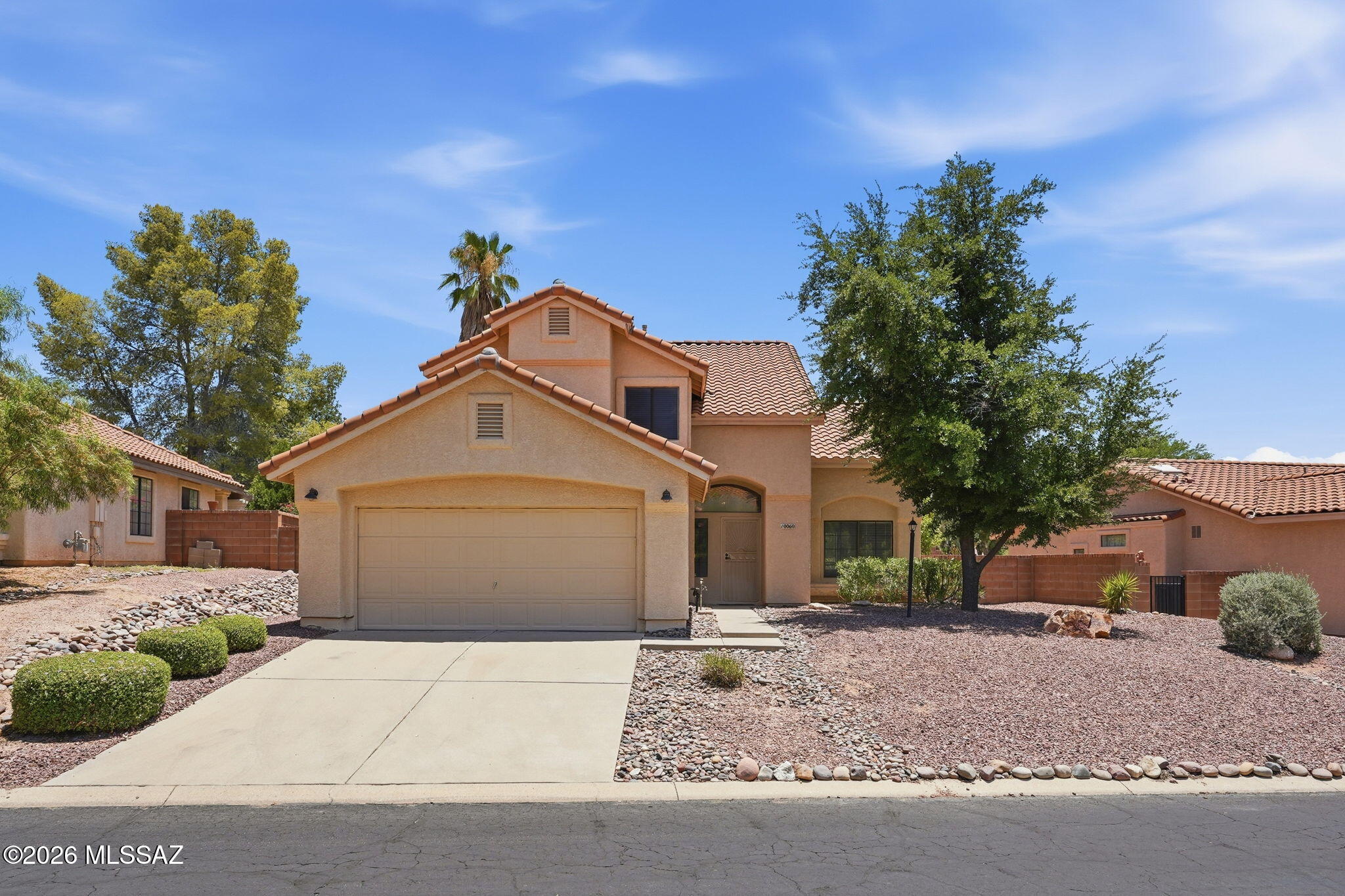 Welcome to this spacious 2,029 sq ft, 2-story home in Oro Valley's desirable Villages of La Canada golf community! Featuring 4 beds and 3 full baths, it shines with fresh interior paint and sleek stainless appliances. The flexible floor plan includes a highly coveted first-floor bedroom and full bath perfect for guests, an office, or multigenerational living. Entertain in the spacious backyard, complete with mature fruit trees. Enjoy easy access to shopping, dining, parks, walking and biking trails, top-rated schools, and the Oro Valley Community & Recreation Center featuring golf, tennis, pickleball, fitness, and swimming. Surrounded by the breathtaking Catalina Mountains, this neighborhood provides an exceptional Arizona lifestyle in one of Southern Arizona's most desirable communities.
