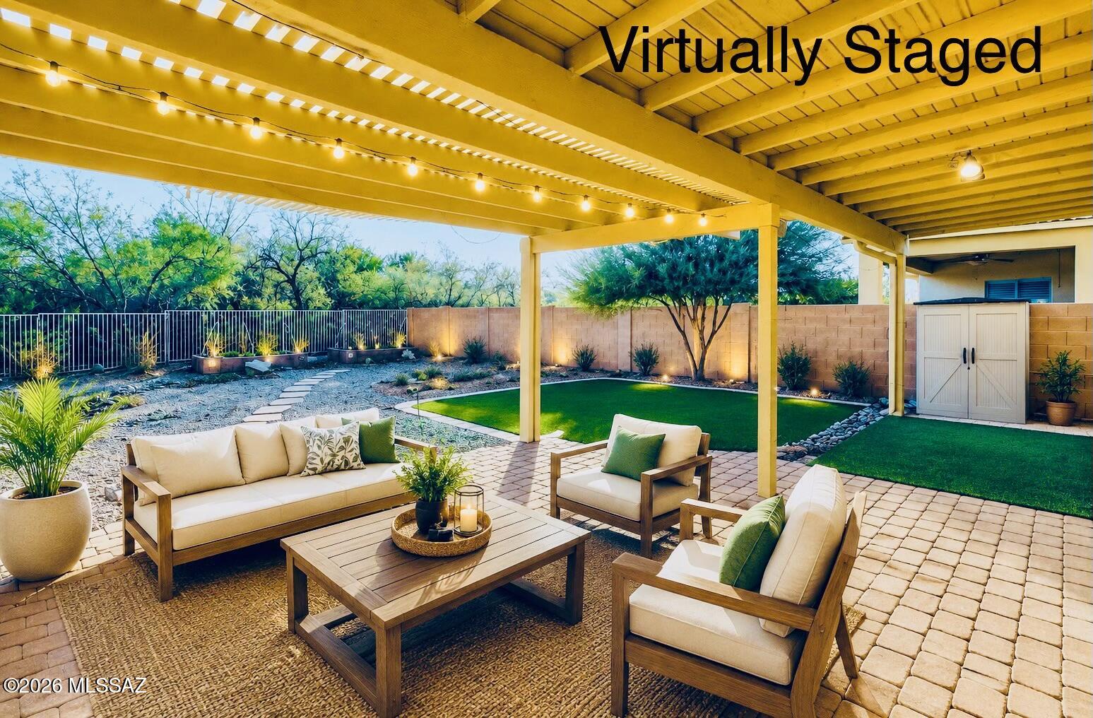 Discover the perfect blend of interior comfort and outdoor tranquility. A spacious layout designed with welcoming functionality and ample spaces are perfect for daily living, entertaining, home office or endless possibilities. The kitchen is well-appointed with granite countertops, Alder wood cabinetry including pull-out shelving and stainless steel appliances. Enjoy the convenience of 1 bedroom downstairs and privacy of an oversized primary suite, 2 additional bedrooms, all with desert and mountain views plus a loft upstairs! The outdoor space is a unique oasis featuring a pergola and peaceful water feature creating a serene ambiance. Enhanced solitude with mature desert, no rear neighbors and some mountain views. Community park, shopping, dining and easy access to I-19. Welcome home!