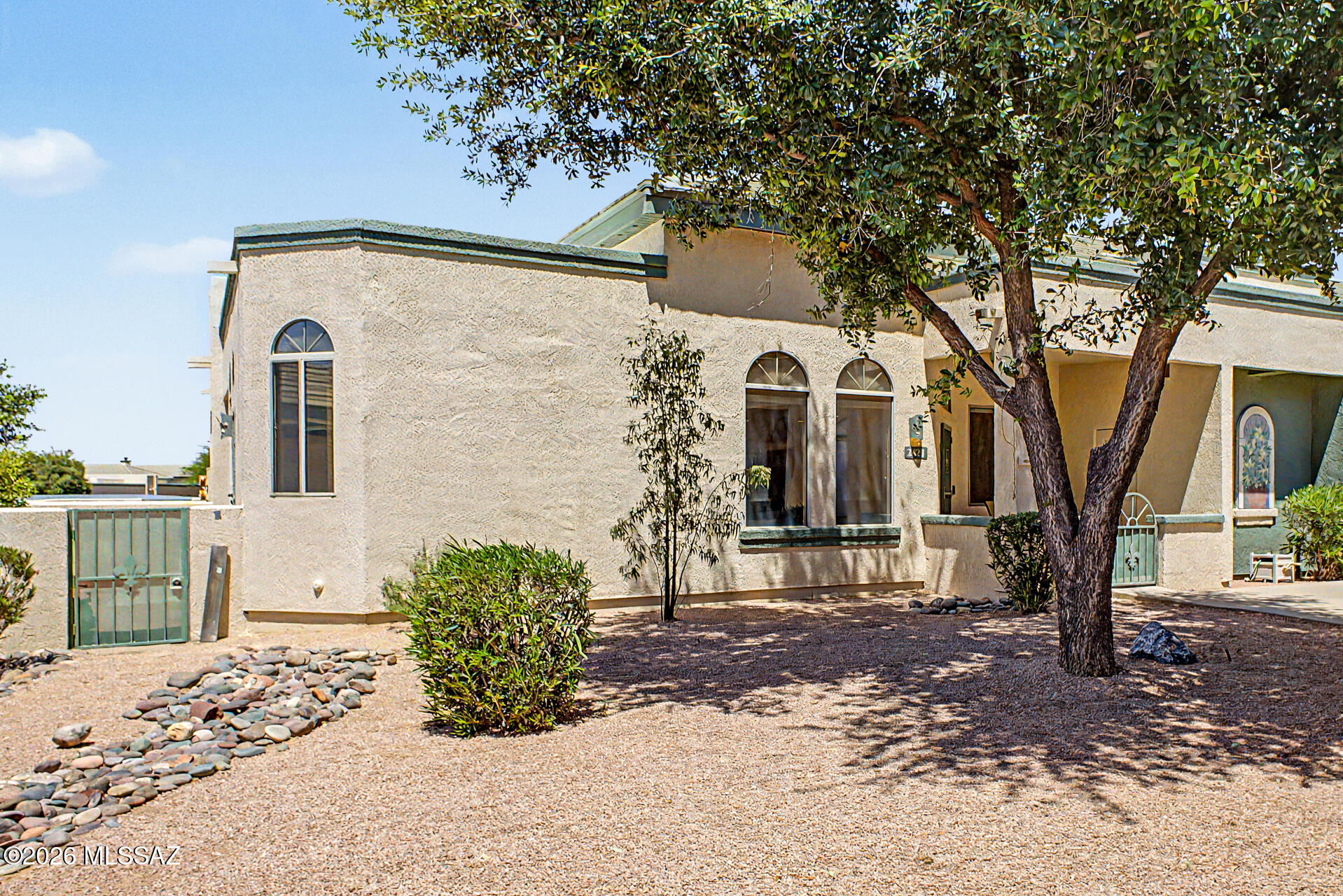 Market Range $245,000 - $260,000 Discover the perfect blend of comfort & convenience in this delightful 2-bed, 2-bath townhome, nestled in a quiet & private location where the outside world softens into birdsong & rusting leaves within the sought-after NW 55+ gated community of Mona Lisa Village. This home is move-in ready and built for worry-free living.  No carpeting to worry about. Roof 2024. Located across the Clubhouse, Pool & Spa.   The HOA takes care of water, sewer, trash removal, exterior maintenance & gated security, leaving you free to relax & enjoy your surroundings.  Community is close to Restaurants, Shops, Ann Day Community Park, Dog Park, Medical facilities, Short Distance to Pima Community College NW campus, the YMCA, Bike loop & I-10