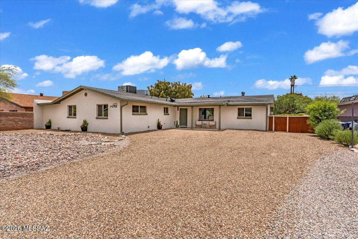 This fabulous single-story home with pool is the one for you! Spacious front & back yards! Inside, you'll discover a perfect blend of style and comfort, featuring vinyl plank flooring, recessed lighting, plenty of natural light, and a neutral palette. The impeccable kitchen is a chef's delight, equipped with shaker cabinets, tile backsplash, beautiful quartz countertops, zellige tile , coffee bar, and waterfall island. The main suite is a true retreat, including a private bathroom with double sinks. Out back, your oasis awaits, complete with a cozy covered patio perfect for morning coffee and quiet evenings, ample seating space with a serene landscape, perfect for barbecues with your loved ones, and a blue pool for a refreshing time! Owner(s) are licensed to sell real estate in Arizona Pool recently resurfaced, roof redone with a transferable 5-year warranty, and new double-pane windows installed throughout.