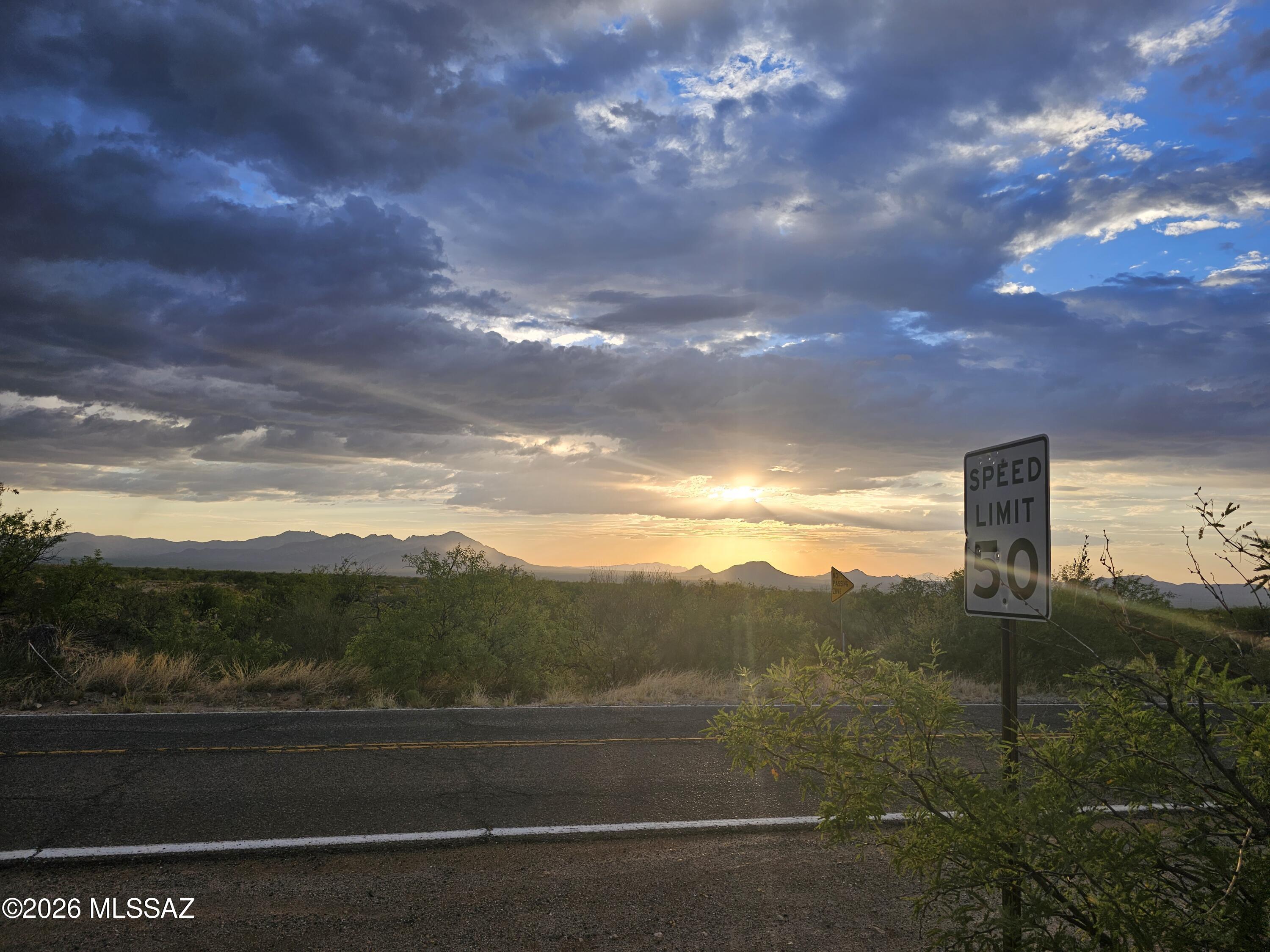 Welcome to Diamond Bell Ranch. Here's your chance to own this flat, buildable, corner lot close to the intersection of Sierrita Mountain and Diamond Bell Road. Lot is elevated to yield superior views of the Baboquivari, Coyote and Sierrita Mountain ranges. Enjoy the fact that you can see a glow from Tucson and Marana while you soak in stellar sunsets and starry nights. Move to now or invest for the future. Owner willing to carry with right terms.