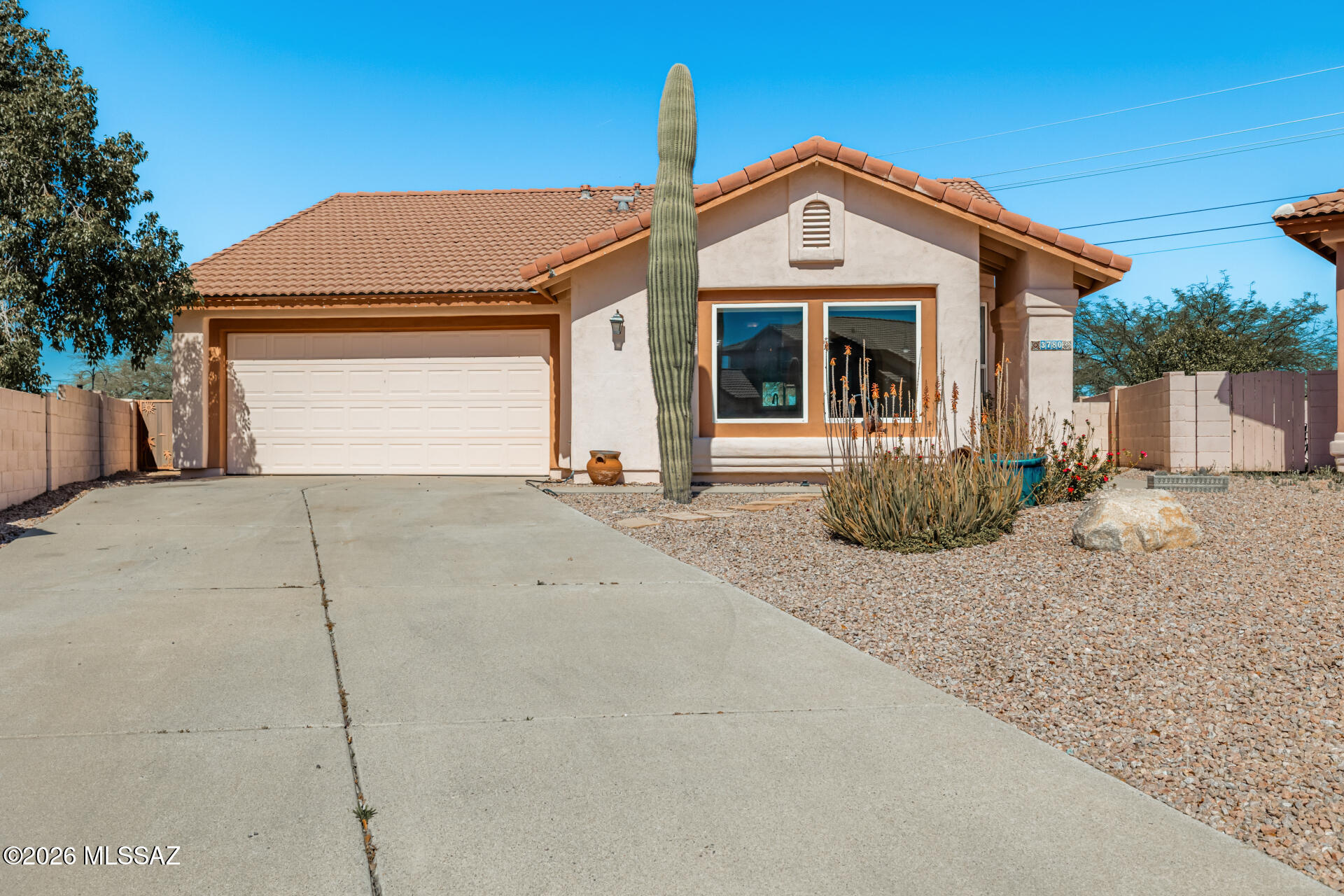 Seller shall accept or counter offers between $299,000 and $325,000.  

Welcome to North Ranch Community, where this immaculate 3-bedroom home awaits! Inside, you'll LOVE the large living room, centered around a cozy fireplace, creating the perfect ambiance for relaxing evenings. Features like tile flooring throughout, vaulted ceilings, large amounts of natural light, and fresh accents enrich the overall appeal. Continue onto the desirable great room, ideal for entertaining guests with ease. The kitchen displays abundant cabinets and stainless steel appliances. Airy primary bedroom offers back patio access, two large-sized closets, and a private bathroom. Lastly, the backyard with a covered patio provides plenty of room for weekend barbecues, outdoor gatherings, or peaceful afternoons under the Arizona sky. You don't want to miss this turn-key gem.  Home comes pre-wired with a Zoned HVAC System, should the new owner choose to activate