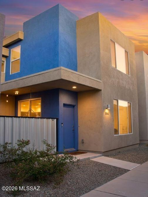 Welcome home to your assumable better than new construction ideally located in central Tucson.  Your elegant and modern 1624 square foot 2-story home with 3 bedrooms, 2 ½ bathrooms and 2-car garage features a solar system to keep your utility bills low throughout the year.  Your home features include installed ceiling fans, light fixtures, and a landscaped, easy-care backyard.  The heart of the home is the chef's kitchen with cooktop, hood, and wall-mounted microwave/oven combination.  The kitchen boasts upgraded coastal shaker Maple cabinets in dusk with granite countertops, and a large, walk-in pantry.  Thoughtful touches include soaring 9-foot ceilings, 8-foot doors, a gas connection in the kitchen, laundry, backyard, and tank water heater. Your energy efficient home is built by Pepper Viner Homes - the 7 time SAHBA Builder of the Year recipient.  Located within close proximity to shopping, dining, and many major employers, including Davis-Monthan AFB, TMC, and the University of Arizona.  Come tour your gorgeous new home today!