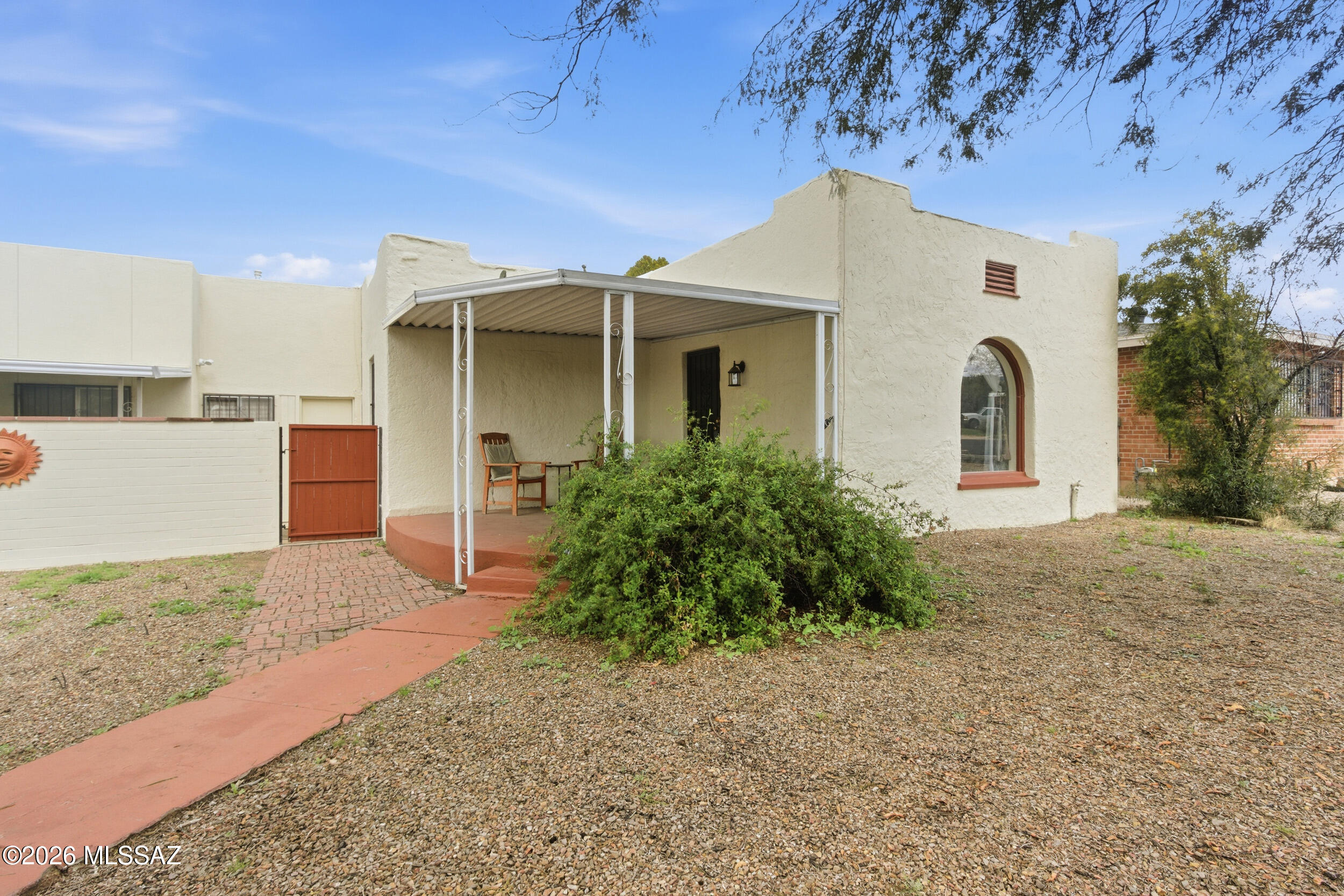 Historic property just a few blocks North of UofA! Rent is $1500/month + additional Fee of $350 per month covers all utilities, (Water, Gas & Electric) Upgraded Luxury Vinyl Plank Flooring in Living Room, 2 Bedrooms, & New Kitchen! Split plan with 3 Bedrooms & 2 Baths, Brand New Spacious Kitchen, with Stainless Steel appliances and Large Master Suite with Private Bath. Off-Street Parking & Laundry facilities on-site.  Big walled yard professionally landscaped, a private Oasis with Mature Shade Trees,patio and seating areas! Off Street Parking on a Permit only street - So close to the UofA!  Guest House is available at $1000/month + $200 /month for ALL UTILITIES - reference MLS #22608273.  Jefferson Park Neighborhood Info @ http://www.jeffersonpark.info