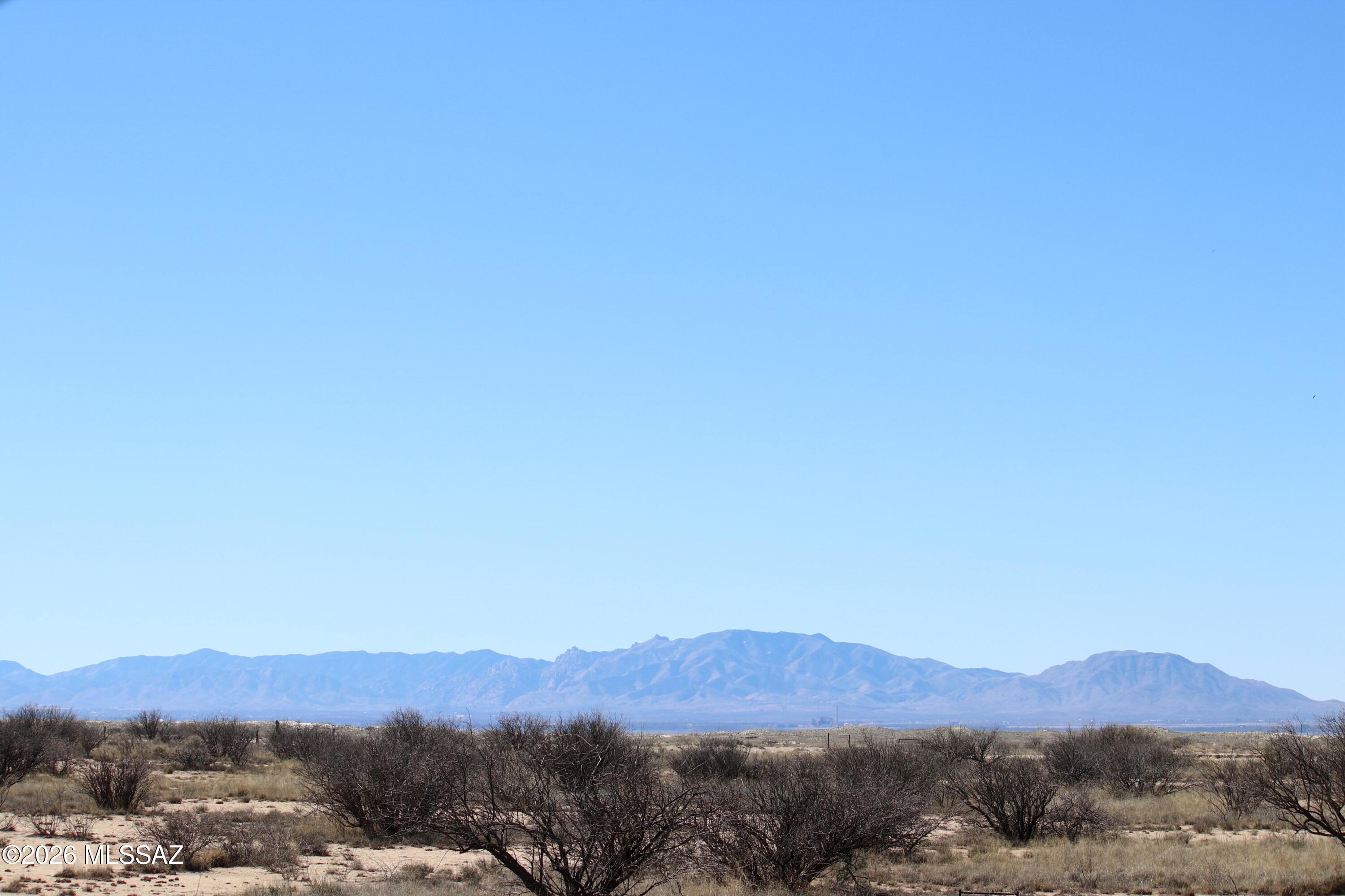 Beautiful property, over 40 acres with spectacular mountain views, located 10 minutes outside Willcox, Arizona. The property's elevation is approximately 4167, where you can enjoy stargazing on cool summer nights while listening to the sounds of nature. Spectacular 360 views of the Dos Cabezas, Cochise Stronghold, and Chiricahua Mountains. Zoned RU4; build a home with limited restrictions, and quick access to nearby towns and Interstate 10 for an easy commute to surrounding areas such as Benson and Safford. Come to Willcox and enjoy wineries, festivals, concerts, and small-town amenities. Owner Financing available. Your dreams await you.