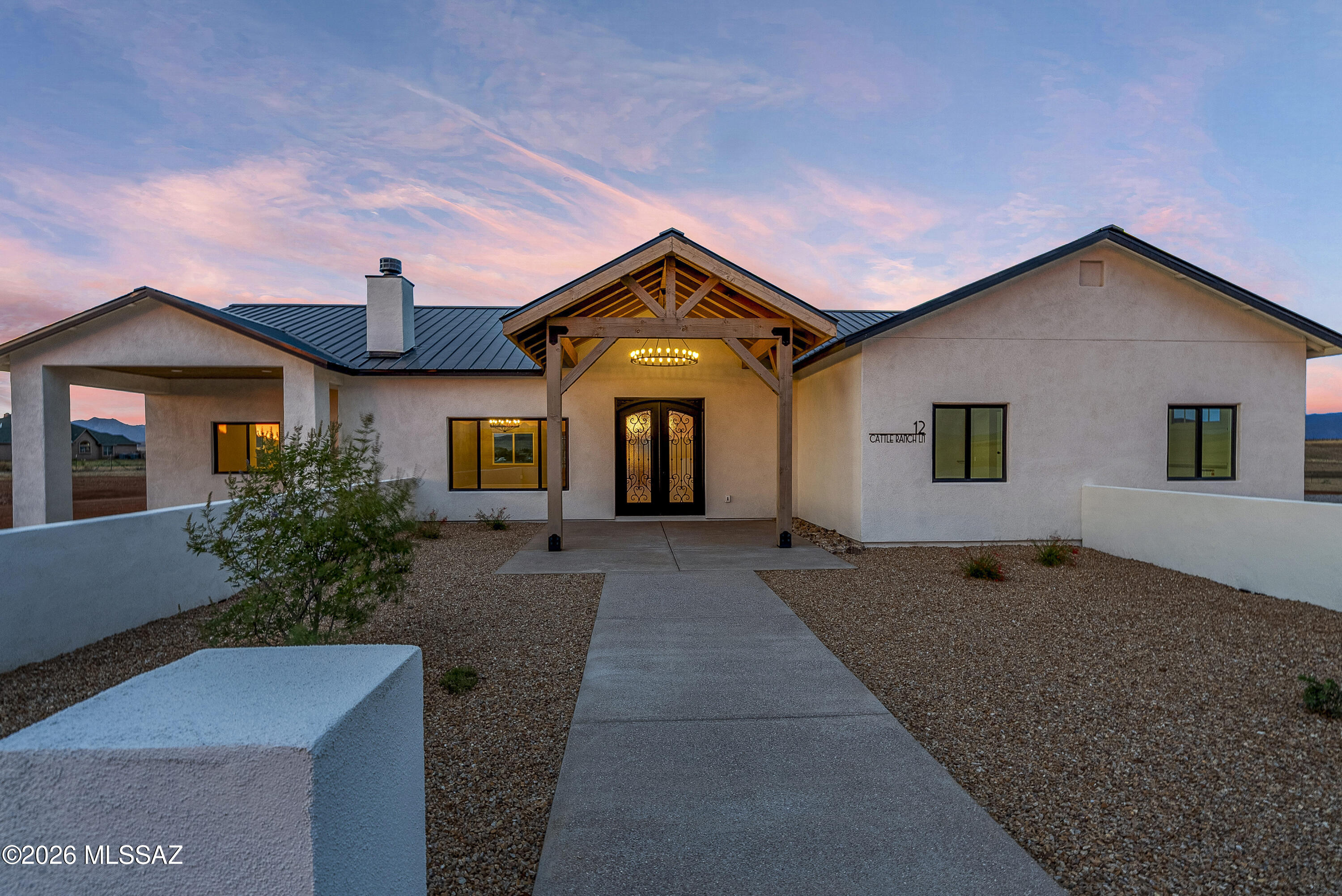 Set on 5 private acres, this newly built home was designed to frame the landscape of Southern Arizona Wine Country: sunrise over the grasslands, sunset melting into the mountains, and wide-open skies stretching across every window. If you've been waiting for a home that feels like a retreat, this is it. Viatera Delicato Quartz countertops, White Oak hardwood flooring throughout, Marble-Clad bathrooms with spa-level finishes and refined details throughout this luxury design. Minutes from Sonoita and Elgin's wineries and tasting rooms, this home offers a lifestyle rooted in nature, community, and wide-open luxury. Cooler temperatures, dark skies, and peaceful desert living make this area one of Southern Arizona's most sought-after escapes.