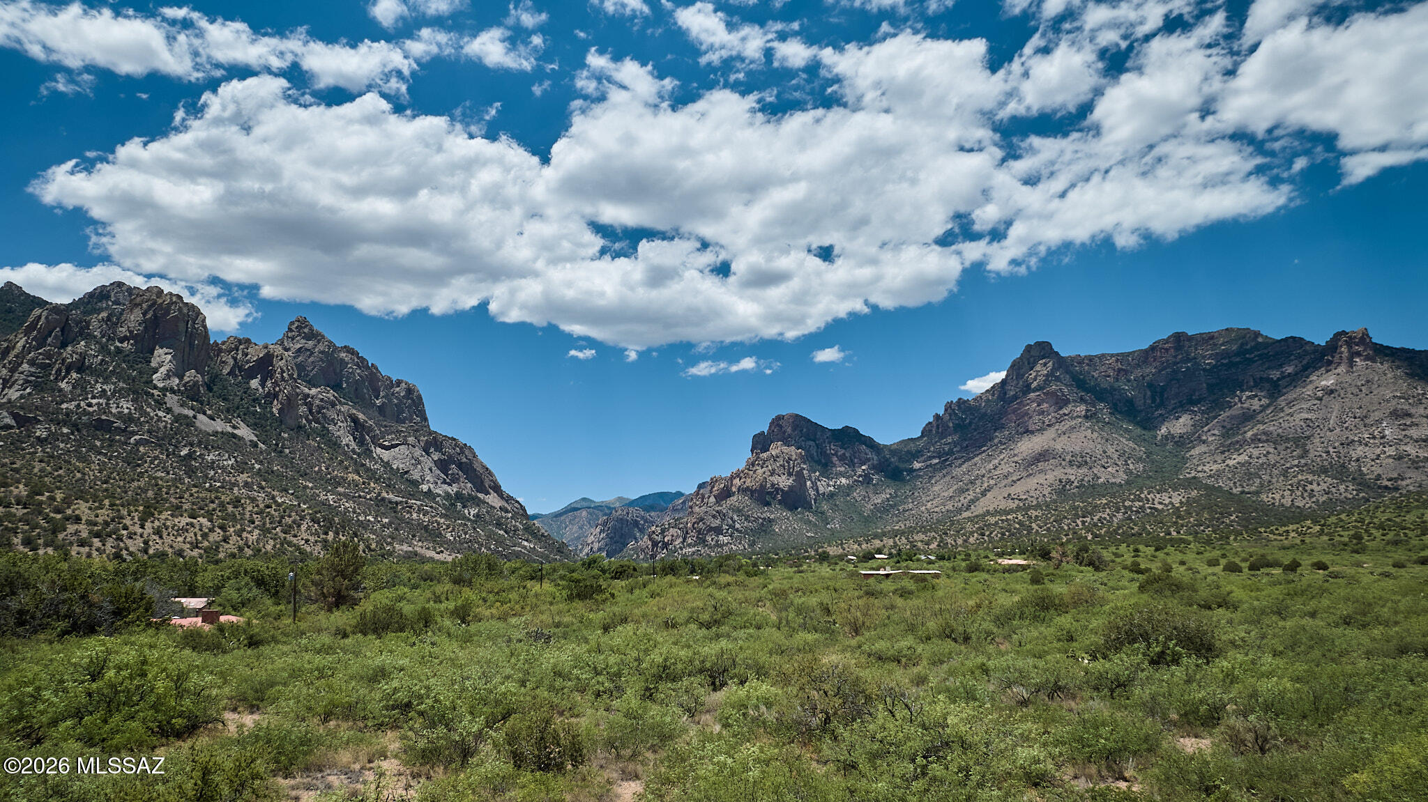 Discover nearly 7.5 acres of prime, flat land in the heart of Portal, Arizona, one of the Southwest's most breathtaking and unspoiled mountain communities. Nestled at the edge of the Chiricahua Mountains, this exceptional parcel offers jaw-dropping, panoramic views in every direction-towering rock formations, wide-open skies, and dramatic desert sunsets that never get old. The lot is level and fully usable, making it ideal for building your dream home, a retreat, or a quiet getaway surrounded by nature. A power box is already on the property, adding real value and making future development easier and more cost-effective. Portal is known for its dark night skies, peaceful atmosphere, and incredible wildlife, attracting birders, hikers, artists, and anyone craving space and serenity.