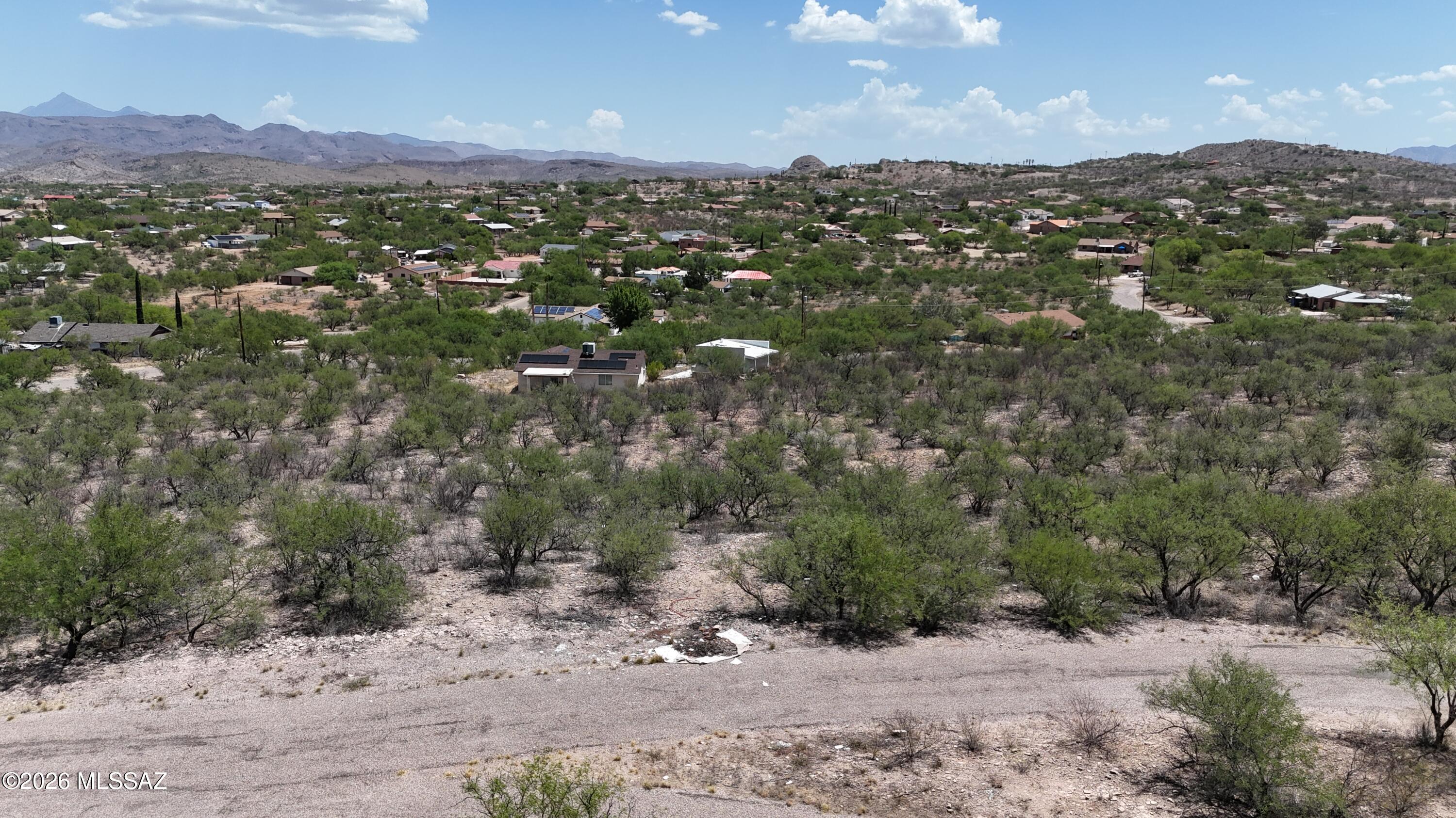 Just over half an acre, Mostly flat.  Mountain view, Paved roads.