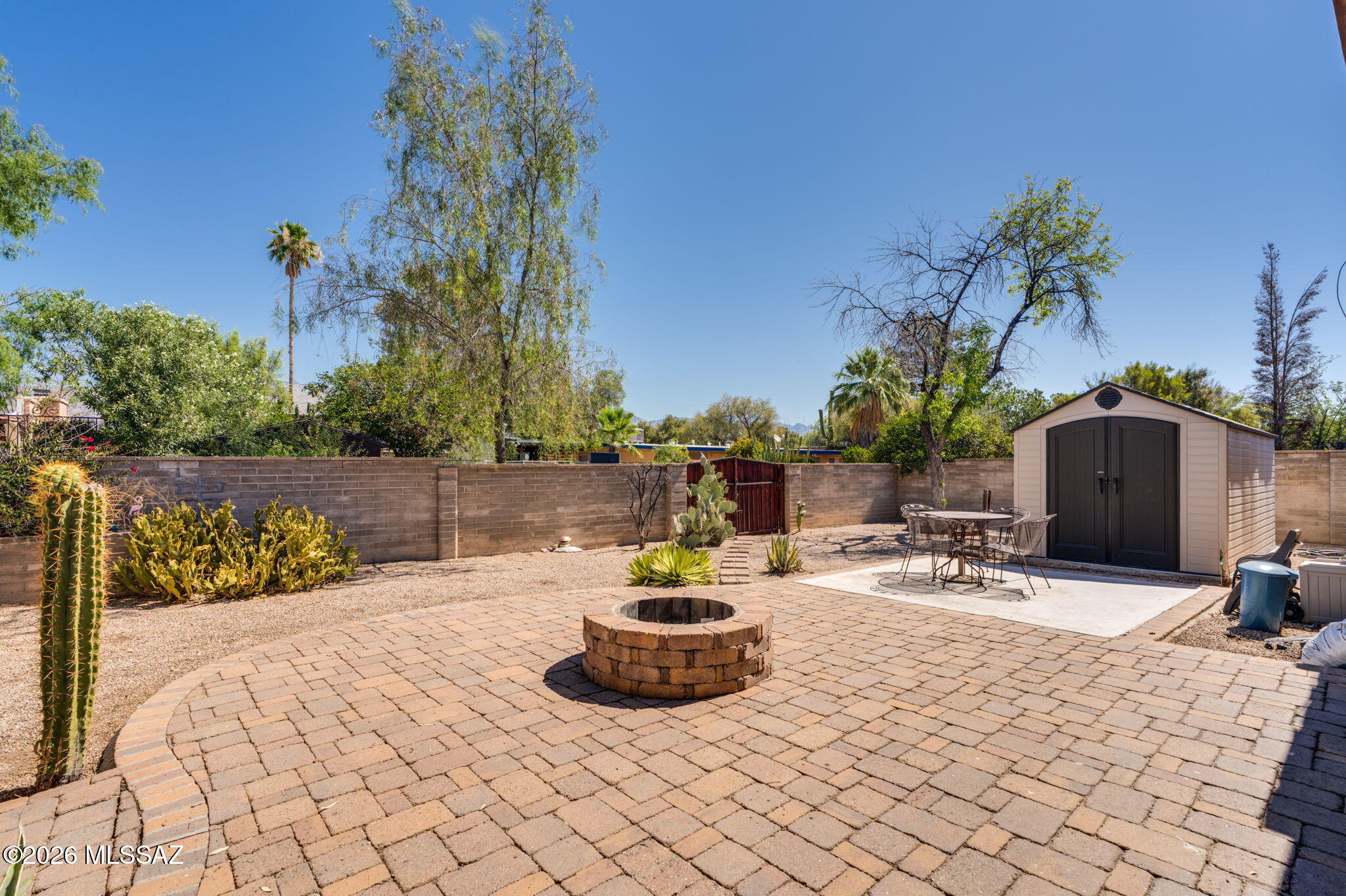 Welcome to this beautifully maintained, pride-of-ownership home, offering 3 spacious bedrooms and 2 full bathrooms. Large, covered carport and storage leads you into the entry door. Step inside to a light-filled living space, with huge arched windows framing the desirable front yard. Ceramic tile runs throughout, and custom kitchen elevates the design. Enjoy peace of mind with brand new roof and new HVAC system. Work from home in the dedicated office area. A large Arizona room, perfect for year-round enjoyment, plus there is a separate laundry room just off the AZ room for added convenience, Don't miss your chance to own this gem - schedule your private tour today!