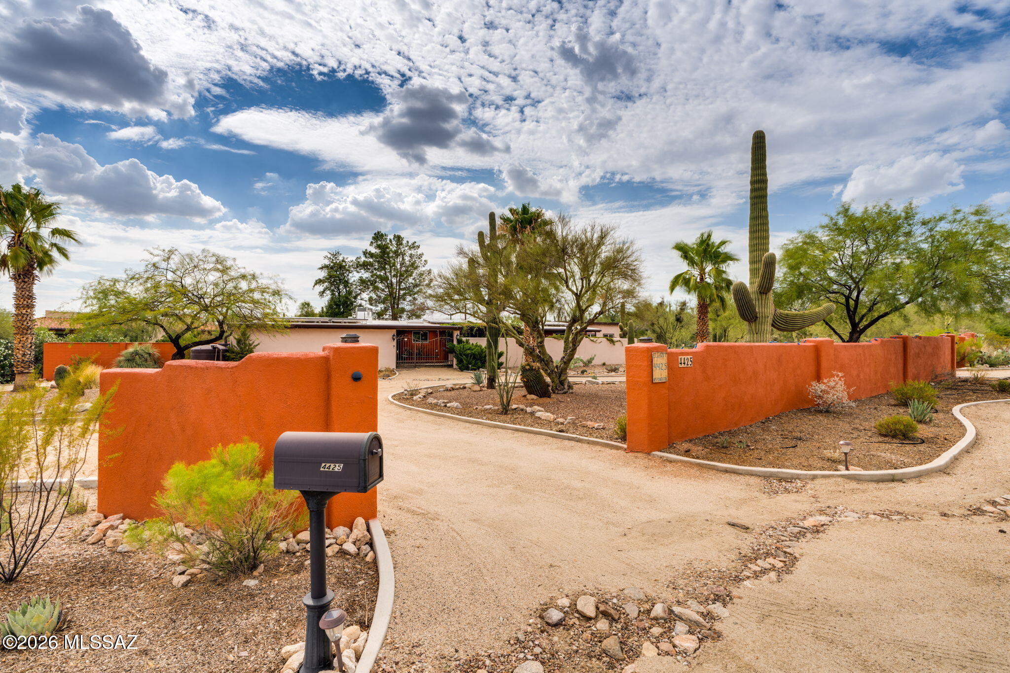 Move-in ready, upgraded and situated on a large private lot in the desirable Catalina Foothills, this inviting 3 BR, 2 BA home offers comfort, beauty and versatility. A tranquil pond with a fountain welcomes you into the private covered front courtyard, draped with mature grapevines and surrounded by lush landscaping. Breathtaking mountain views and a cozy patio create the perfect setting for a peaceful morning coffee or savoring sunsets with guests. Inside, the spacious family room features a cozy fireplace and opens to the covered patio, sparkling pool, and spa, creating an effortless indoor outdoor lifestyle. Sliding glass doors from the living and dining room area also lead to the ample backyard with native plants, making it ideal for gatherings and relaxation. The bright gourmet kitchen, with a brand new gas stove is filled with natural light and offers generous workspace for cooking and entertaining. Other outstanding features include an owned full solar panel system to keep energy costs low, two large water collection tanks, and a detached climate-controlled 500 SF studio/workshop/hobby room with its own private entrance providing exceptional flexibility for a home office, art studio, fitness or yoga room, guest space or creative retreat.
Finally, its prime location, close to  shopping, golf, dining and hiking trails offers everything you need to make you feel at home!
Please see attached list of the improvements made by the Seller.