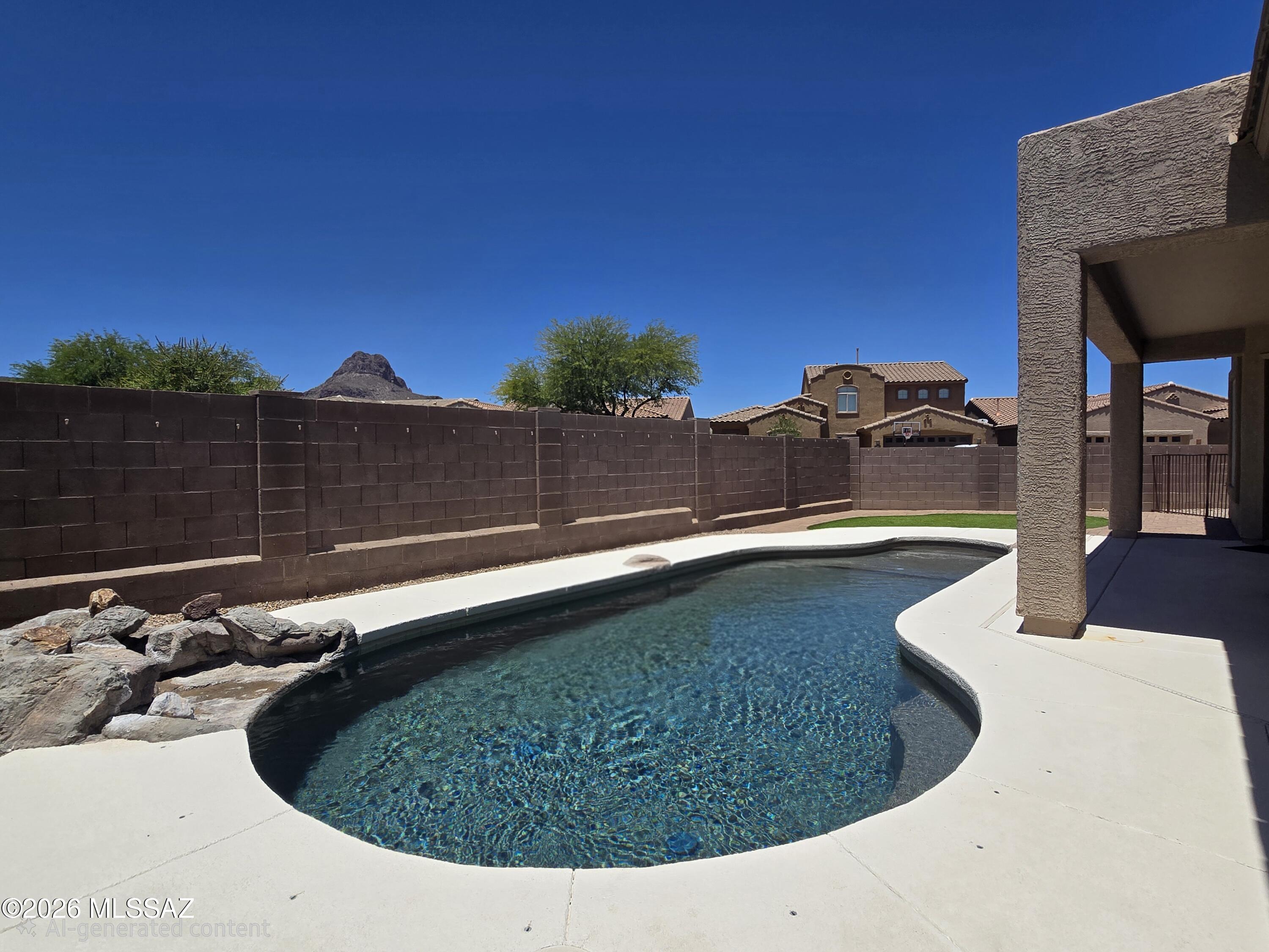Stunning 4-BR, 3-full bath home on a spacious corner lot in Continental Reserve. With a sparkling pebble-tec pool, sports court, and a flexible, open floor plan, this home offers the perfect blend of comfort, style. Inside, you'll find Beautifully custom updated bathrooms, modern finishes, and a bright layout that includes a versatile flex room ideal for a home office, gym, or playroom. The fully landscaped backyard is designed for year-round enjoyment, featuring artificial turf, a Kool Deck pool surround, electric pool heater, and plenty of space for relaxing or entertaining. Additional home features include a Nest thermostat, ADT security system with video doorbell, water softener, and whole-house filtration system. Located just minutes from I-10, hiking trails, shopping, and restaurants. Rent includes weekly pool service.  Pets welcome upon approval with an additional security deposit.
