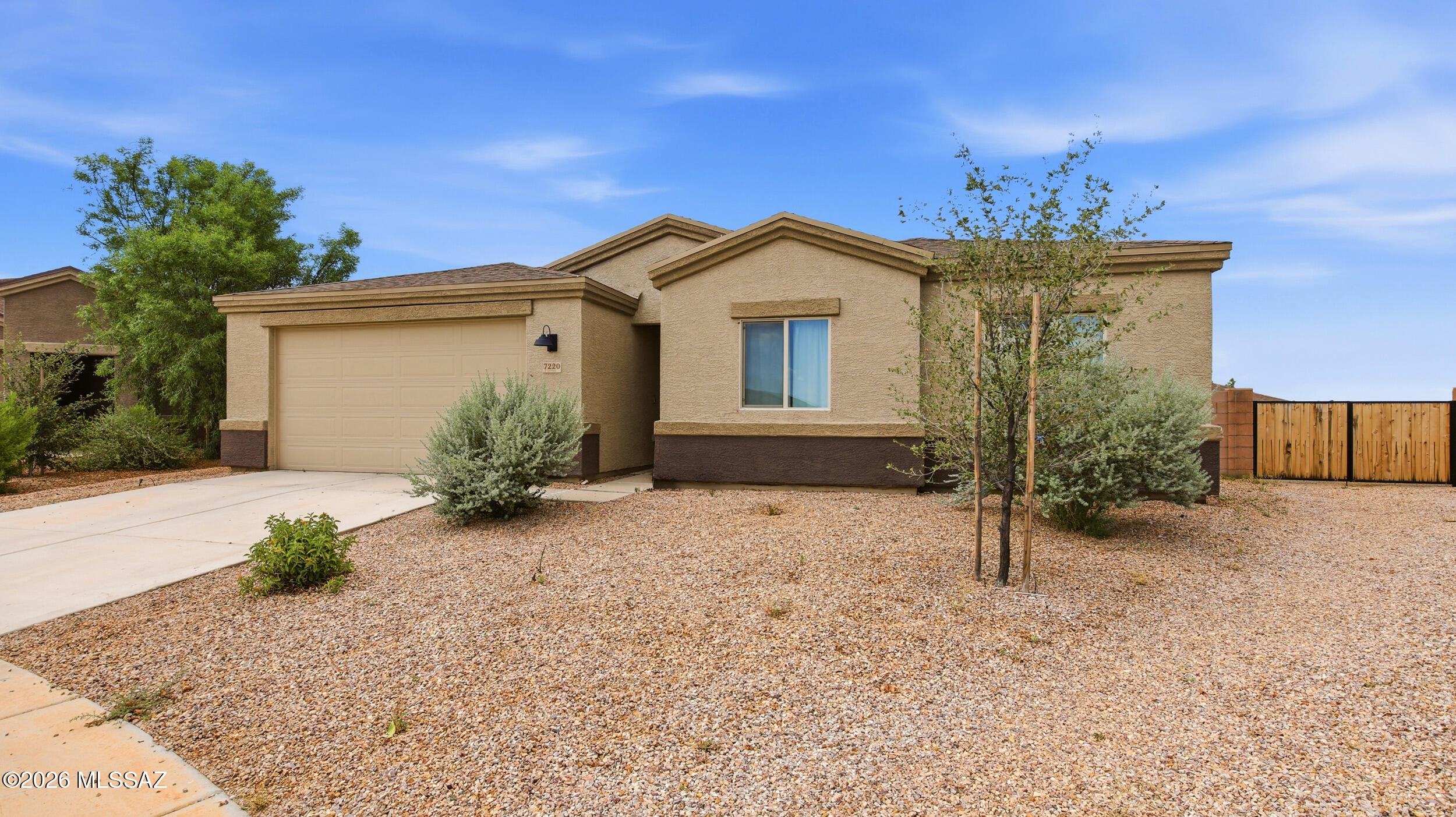 Built in 2022, this beautifully maintained 3-bedroom, 2-bath home offers 1,583 square feet of modern living in the desirable Star Valley community. The thoughtfully designed open-concept floor plan features a spacious living area that flows seamlessly into the kitchen, creating the perfect space for everyday living and entertaining. Step outside to a professionally landscaped backyard complete with pavers and low-maintenance turf, providing a private outdoor retreat ideal for relaxing or hosting guests. With contemporary finishes, a functional layout, and a move-in-ready feel, this home is an exceptional opportunity to enjoy comfortable living in one of Tucson's growing communities.