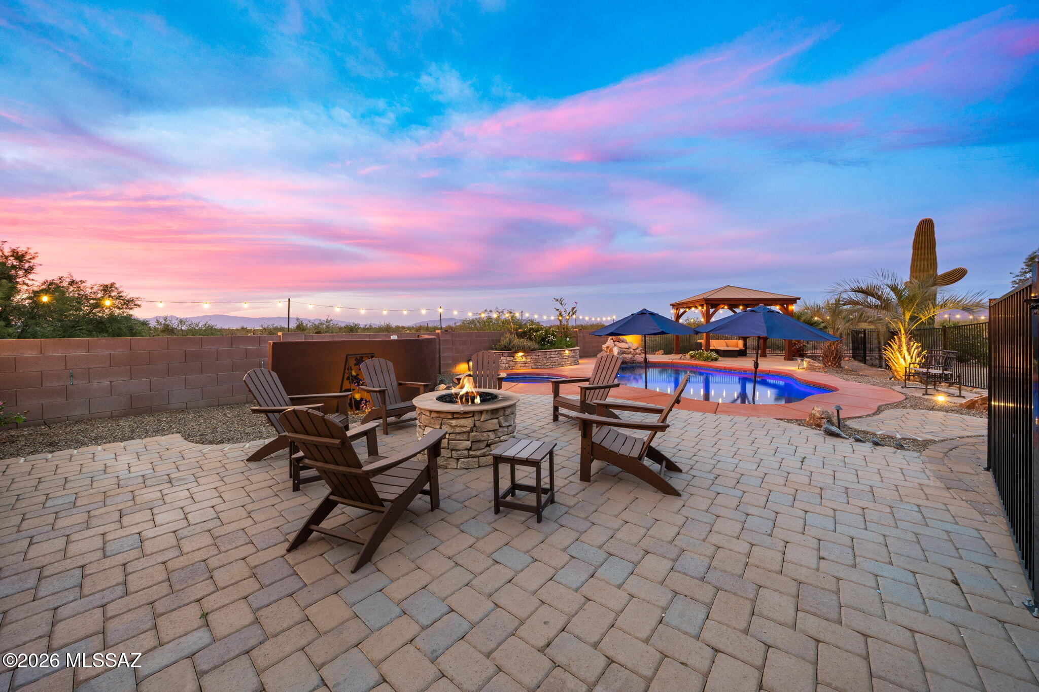 Seller now offering a 2/1 Interest Rate Buydown @4.5% year 1. See Documents for more details. 
This desert oasis perfectly blends modern comfort with a curated SOAZ indoor-outdoor lifestyle. Step inside to find an airy, light-filled floor plan designed for effortless living & entertaining. The spacious kitchen serves as the home's heart, featuring upgraded finishes and sleek appliances. Retreat to the spacious primary suite, offering a private sanctuary after a long day. The true highlight is the expansive backyard-set on a full acre of space; boasting privacy & panoramic views; Your dream outdoor retreat. Whether hosting summer BBQs or enjoying a quiet sunrise over the mountains, Experience the best of Arizona living with parks, top-rated schools, & community amenities just minutes away!