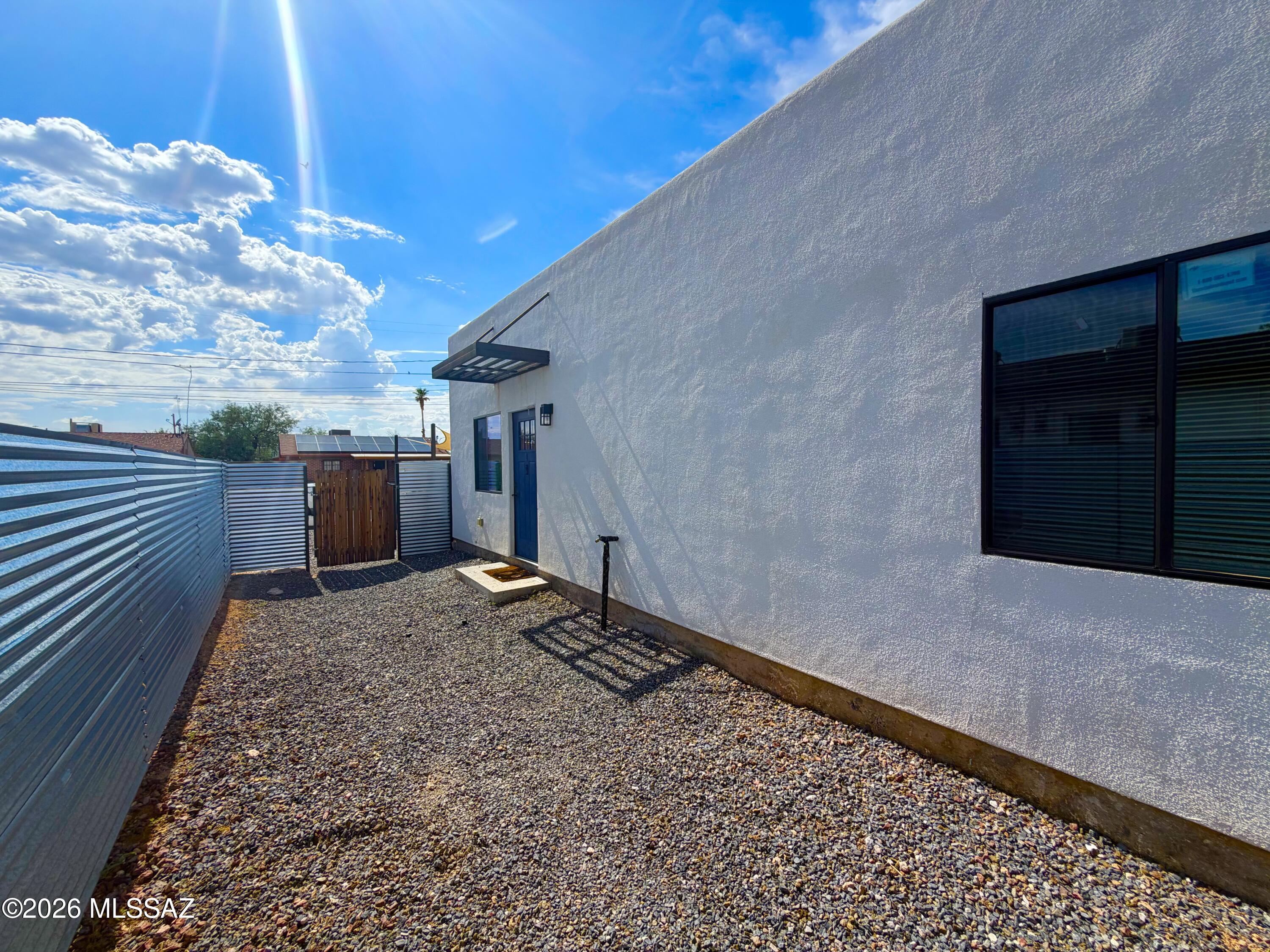 Built in 2021, this exceptional duplex offers the perfect combination of modern design, low-maintenance ownership, and outstanding investment potential in the heart of Central Tucson. Each unit features contemporary finishes, open-concept living spaces, quality craftsmanship, and durable materials designed for years of hassle-free ownership. The stunning resort-style pool creates a rare amenity that enhances tenant appeal and rental demand. Currently generating $3,100 per month in rental income, this turnkey property is an excellent opportunity for investors or owner-occupants. Its prime location also makes it an ideal investment for University of Arizona students seeking housing while building equity, or for any investor looking to capitalize on the continued strength of Central Tucson's
