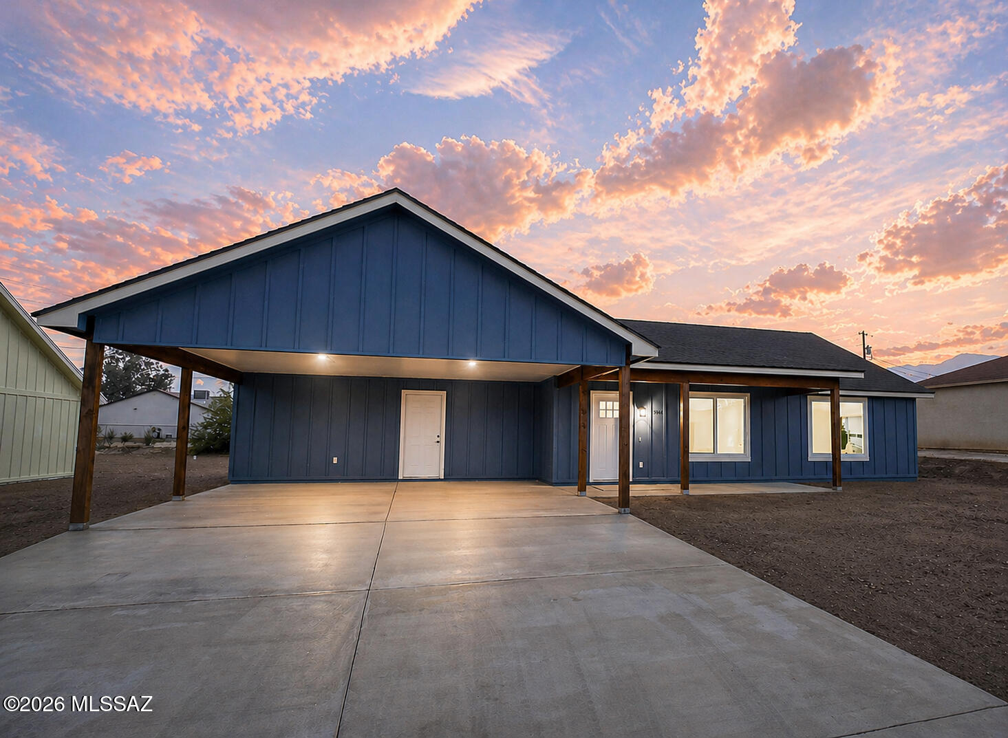 NO REQUIRED HOA FEES! Brand new construction with stunning Mt. Graham views! This thoughtfully designed 3 bedroom, 2 bathroom home offers an open concept layout with a split bedroom floor plan. The kitchen features quartz countertops, stainless dishwasher, gas range, and a large walk-in pantry. Beautiful blonde luxury vinyl plank flooring runs throughout. The spacious primary suite includes dual vanities, a deep soaking tub, separate shower, and large walk-in closet. Built with energy efficiency in mind,spray foam insulation (EVEN THE CARPORT) tankless on-demand gas water heater, dual pack heating and cooling. Large laundry room, covered front and back patios, and two-car carport. Located near Roper Lake, Dankworth Pond, and Swift Trail. Owner/Agent