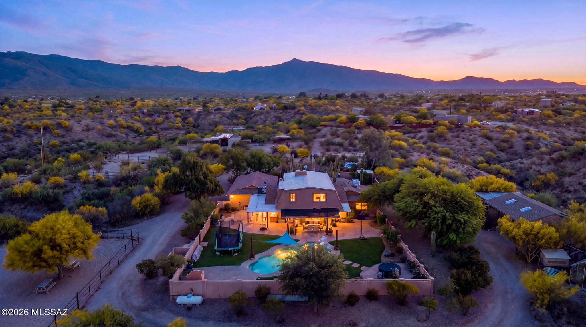 Some properties are built. This one has been perfected. Set on 5 fully fenced acres in Vail with uninterrupted 360° views of all four mountain ranges, this 4BD/2BA + loft luxury ranch retreat was featured in Tucson Lifestyle Magazine... then the owners went to work. Rubberized stucco exterior, new roof, AC, water heater, full appliance suite, solar-powered gate, new pool equipment, custom safety cover, turf & landscaping, L2 EV charger, 30-amp RV outlet, custom lifetime fencing, and two ~3/4 acre pastures with custom shade. Equestrian facilities include 3-6 stalls, tack room, round pen, arena & Pantano Wash trail access. Vail Unified Schools.