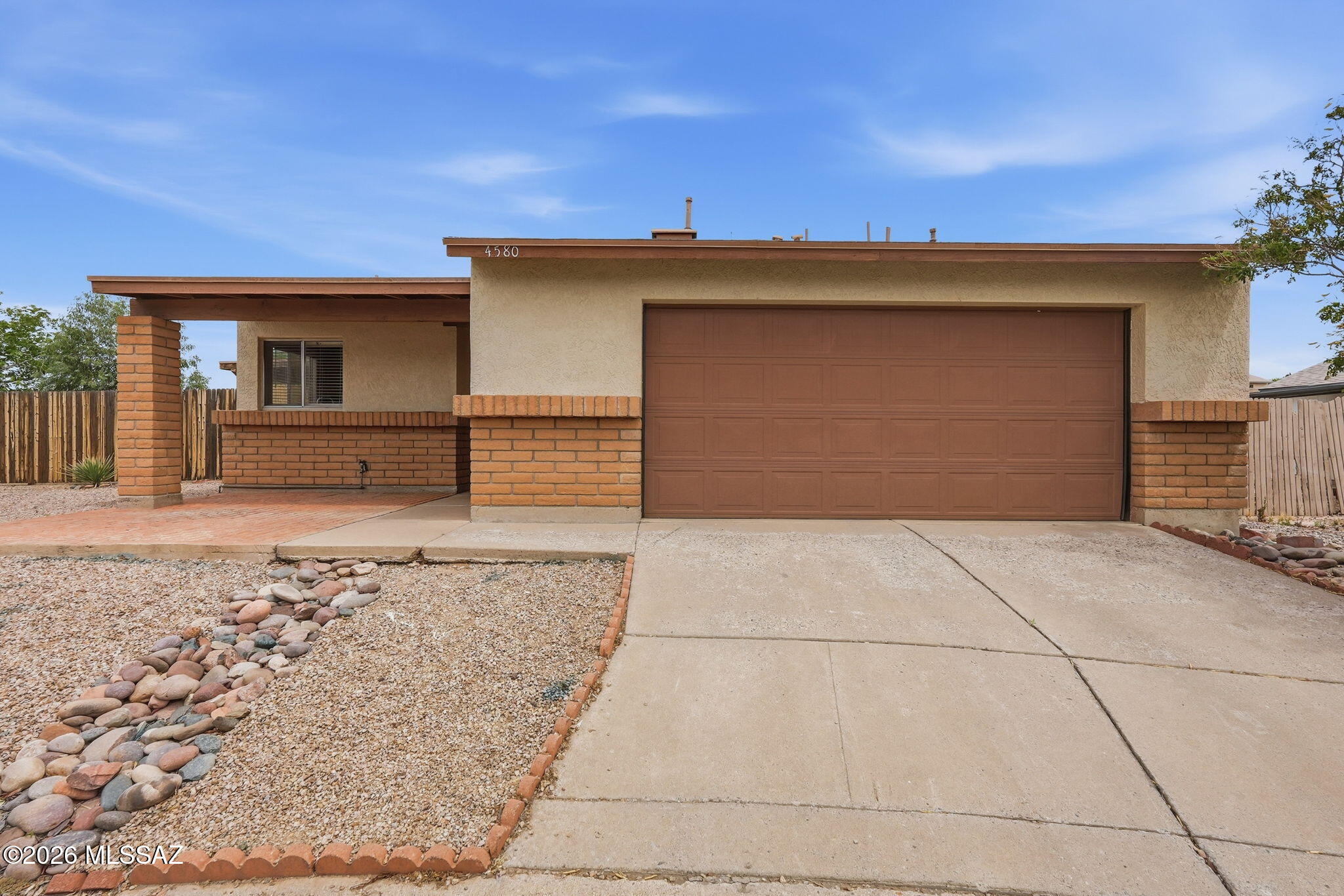 Charming multi-level home located in the desirable Gatewood Ranch community, tucked away on a quiet cul-de-sac. This 3-bedroom, 2-bathroom residence offers a functional split-level layout with spacious living areas and plenty of natural light. The peaceful setting provides added privacy while still being conveniently close to shopping, dining, and major roadways. Ideal for homeowners seeking comfort, space, and a well-established neighborhood. A great opportunity in Northwest Tucson!