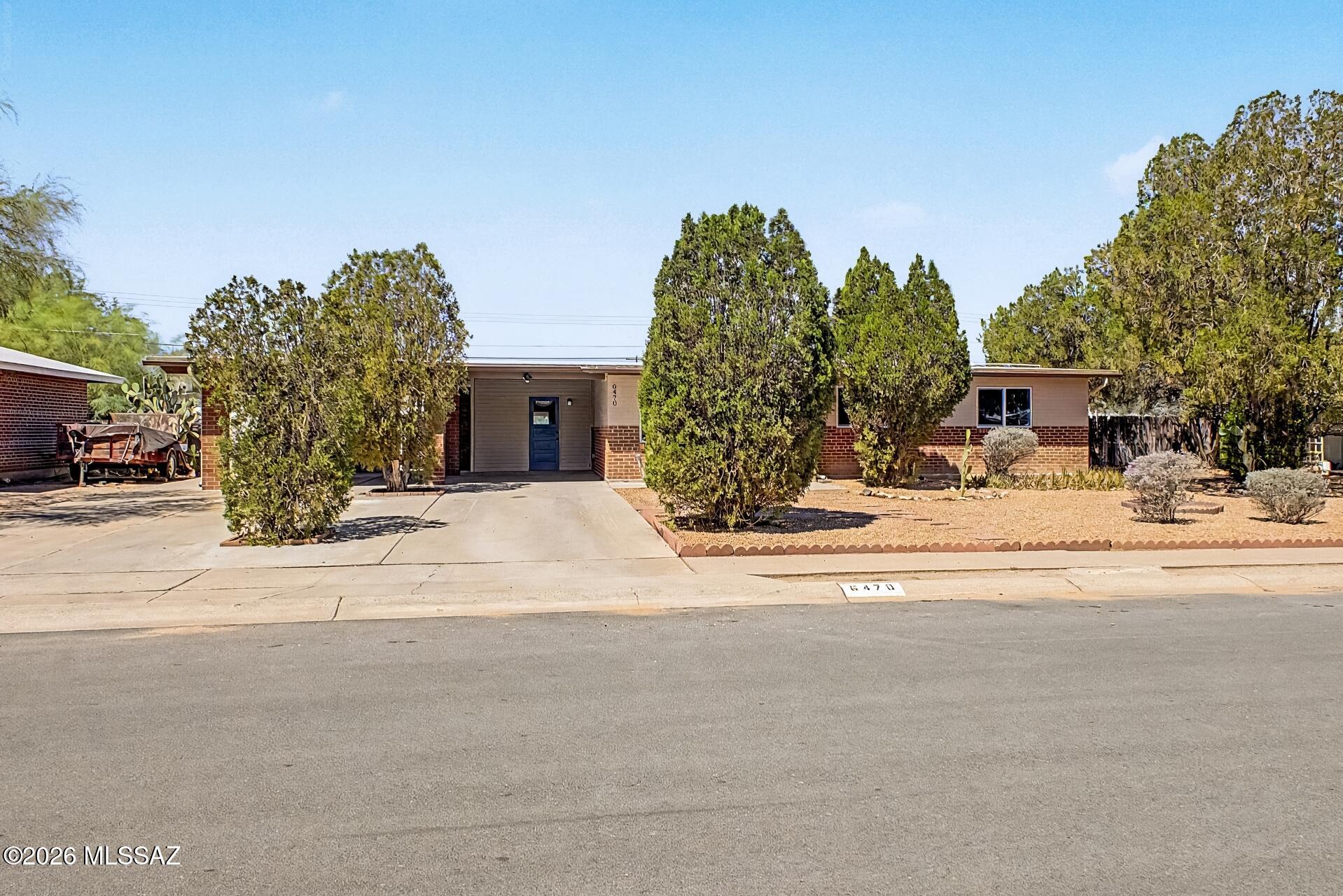 List Range Pricing, Seller will accept or counter offers between $337,400 - $357,400 - Beautifully updated 4bd/2ba home with modern finishes and a versatile floor plan. Enjoy both a spacious living room and separate family room, perfect for entertaining or everyday living. The open kitchen features white shaker cabinets, quartz countertops, and ample storage. Both bathrooms have been tastefully remodeled with stylish tiled showers. A separate 4th bd offers privacy for guests, a home office, or multigenerational living. Outside, you'll find an oversized carport with multiple workshops and storage sheds, plus a fully covered patio for year-round enjoyment. There's also plenty of room for an RV, boat, trailer, or all your outdoor toys. Move-in ready with space for everyone and everything