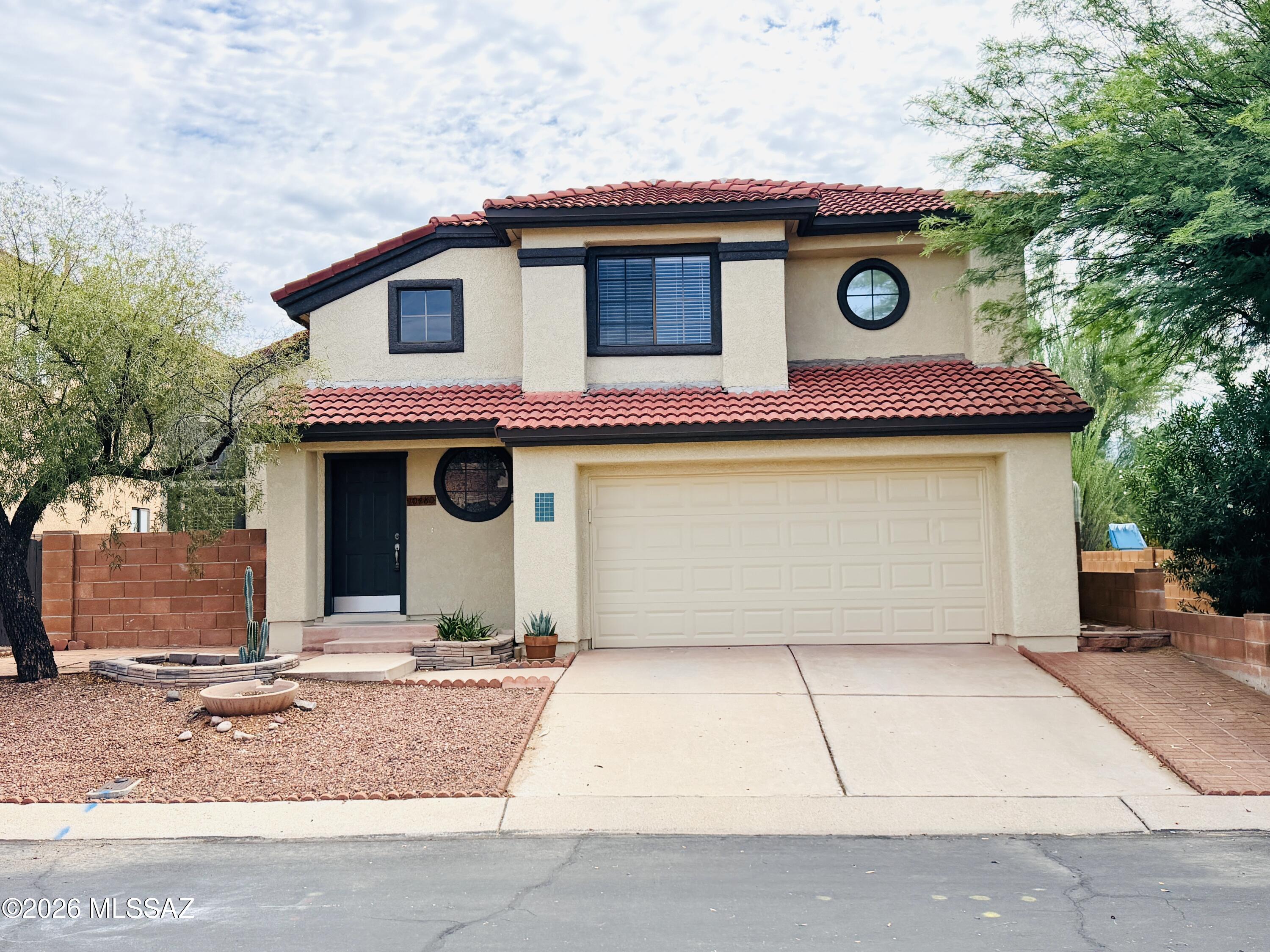 Beautiful mountain views! Located in the desirable Lambert Lane community in Oro Valley, this beautifully maintained 4bd/2.5ba home offers character and style. Inside, you'll find vaulted ceilings, distinctive oculus windows, and stylish architectural details that create an inviting and unique living space. The kitchen features granite countertops and ample counterspace, while the home's no-carpet flooring provides a clean, modern look that's easy to maintain. The spacious primary suite includes an updated bathroom with a stunning walk-in shower, creating a relaxing retreat.
Step outside and enjoy access to the community pool and Riverfront Park. Combining charm, thoughtful updates, and a sought-after Oro Valley location, this home is ready to welcome its next owner.