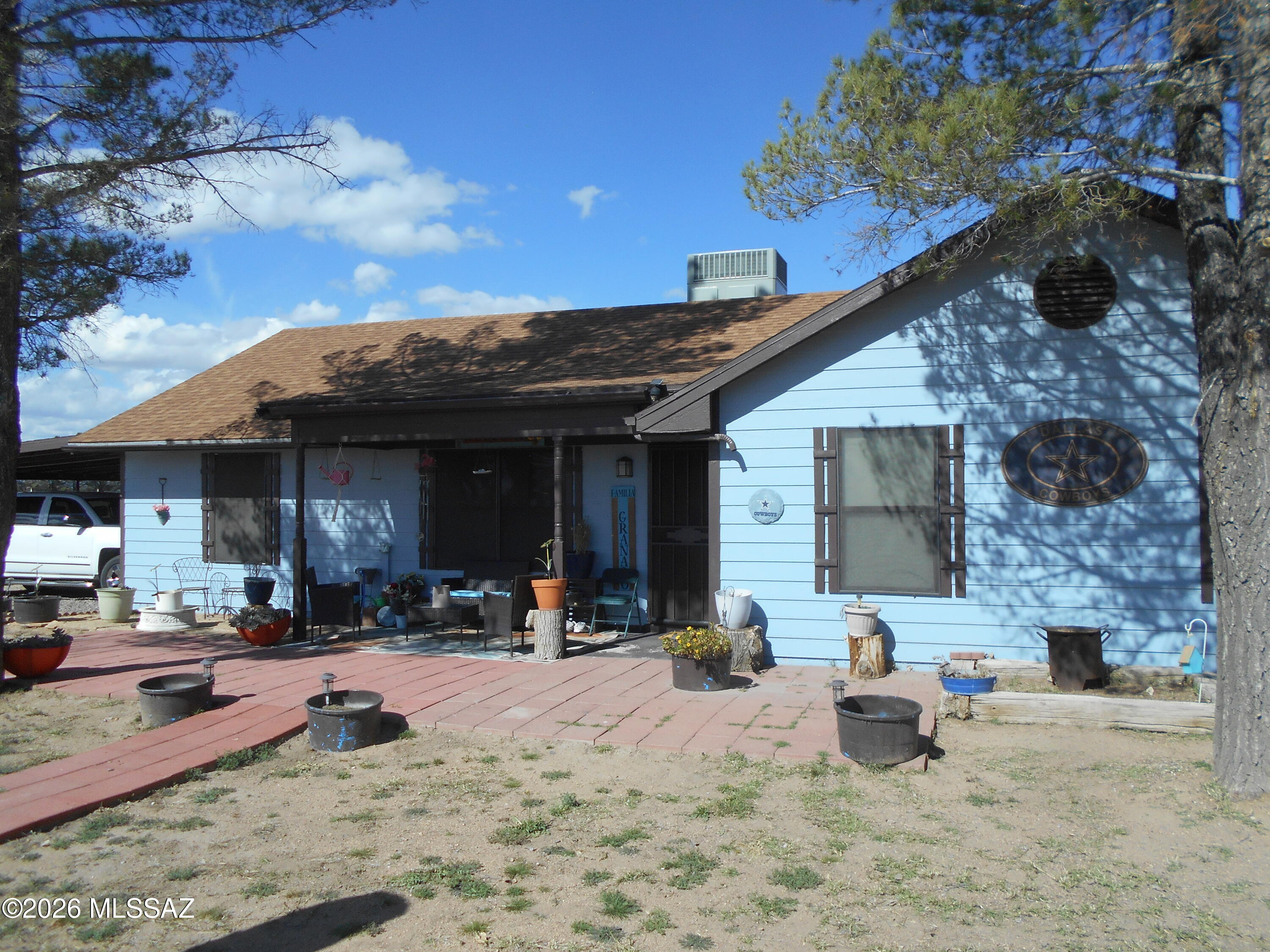 PRICE REDUCTION!!! Beautiful, large home on over 1.5 acres in a great neighborhood, with many lovely design choices, pride of ownership, many large shade trees, and convenient access to paved Taylor Road! Just a short drive to Willcox for all you need! This large home has so much room, including a fantastic, huge game room for entertaining! In the back of the property is a concrete fire pit for pit barbecuing! This is a high quality home with newer, useful outbuildings. One of the higher quality homes on the market in the Willcox area. This wonderful home will not be on the market long! Come take a look, and make it your own!