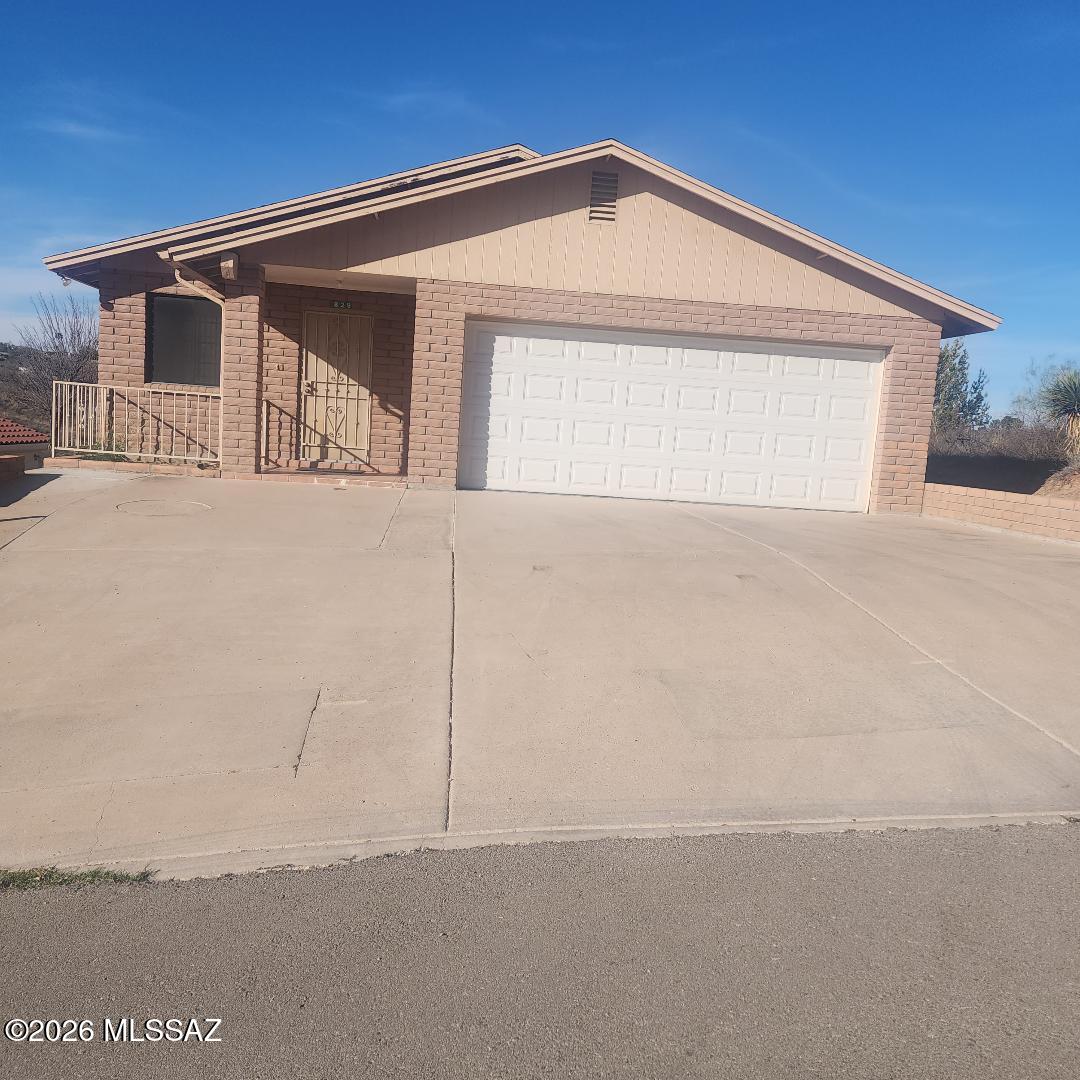 Rancho Grande Townhouse features a view lot, three bedrooms, two baths, double garage, good-size kitchen with natural gas range and oven, sewer connected, no homeowners association, approximately 3 miles from the Mexico border.