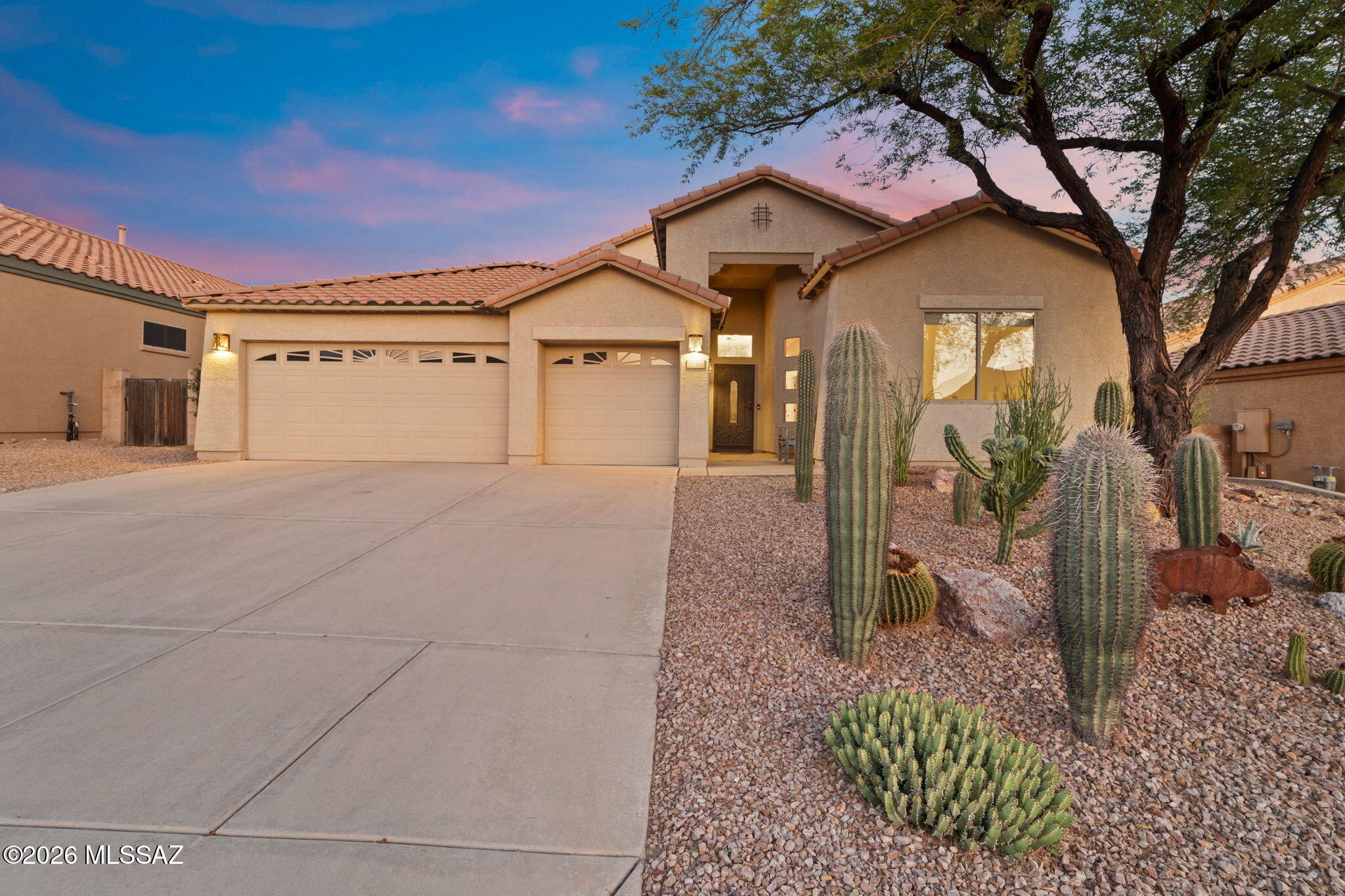 Nestled in the sought-after The Preserve at Dove Mountain, this beautifully maintained 4-bedroom, 2-bath home offers the perfect blend of comfort, privacy, and Arizona outdoor living. Backing to a natural preserve with no rear neighbors, enjoy breathtaking desert views from your resort-style backyard featuring a sparkling pool, relaxing spa, and built-in outdoor kitchen--ideal for entertaining year-round. Inside, the open-concept layout boasts spacious living areas, abundant natural light, and a seamless flow between indoor and outdoor spaces. Experience tranquility, stunning sunsets, and the best of Dove Mountain living in this exceptional home.