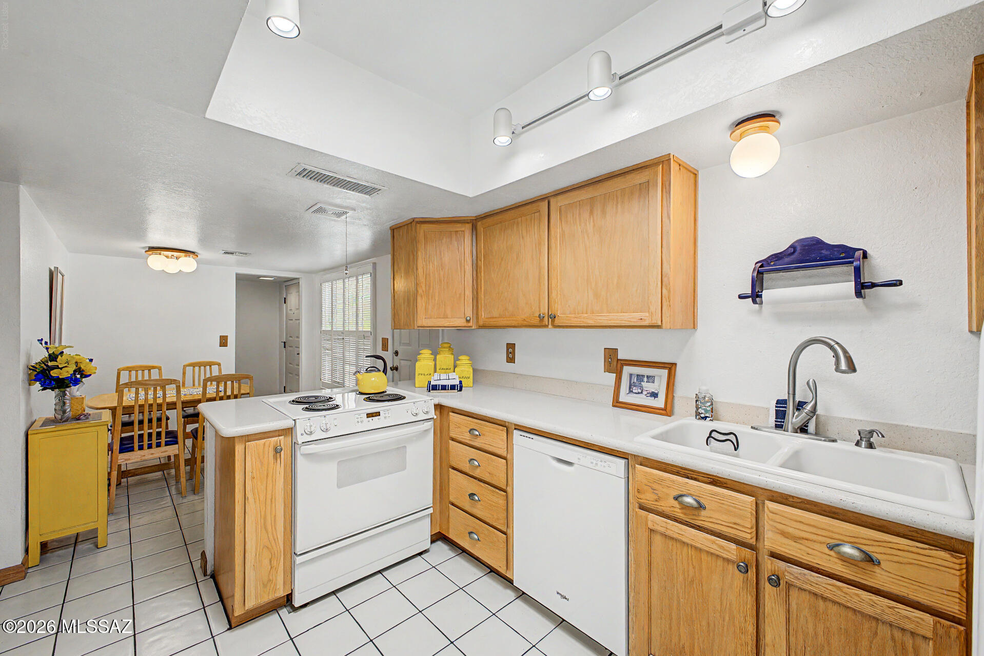 Welcome to this beautifully maintained, fully furnished 2-bedroom, 2-bath townhome in the highly desirable Pantano Townhomes community, ideally located just moments from The Loop, Tucson's premier multi-use trail system offering miles of scenic paths for walking, running, and cycling. Designed for comfortable, low-maintenance living, this inviting home features a bright, open floor plan filled with natural light, spacious living and dining areas, and a well-appointed kitchen with a charming breakfast nook. The desirable split-bedroom layout offers added privacy, while the generously sized primary suite provides a peaceful retreat. Step outside to your private enclosed patio, the perfect place to enjoy your morning coffee and entertain guests. Additional highlights include covered parking, extra storage, and low-maintenance outdoor living.
Being offered fully furnished, this move-in-ready home is ideal as a full-time residence, or winter retreat. Enjoy an exceptional location just minutes from Udall Park, shopping, dining, medical facilities, and everyday conveniences. Offering comfort, convenience, and an unbeatable location, this is an outstanding opportunity to enjoy the best of Tucson living.