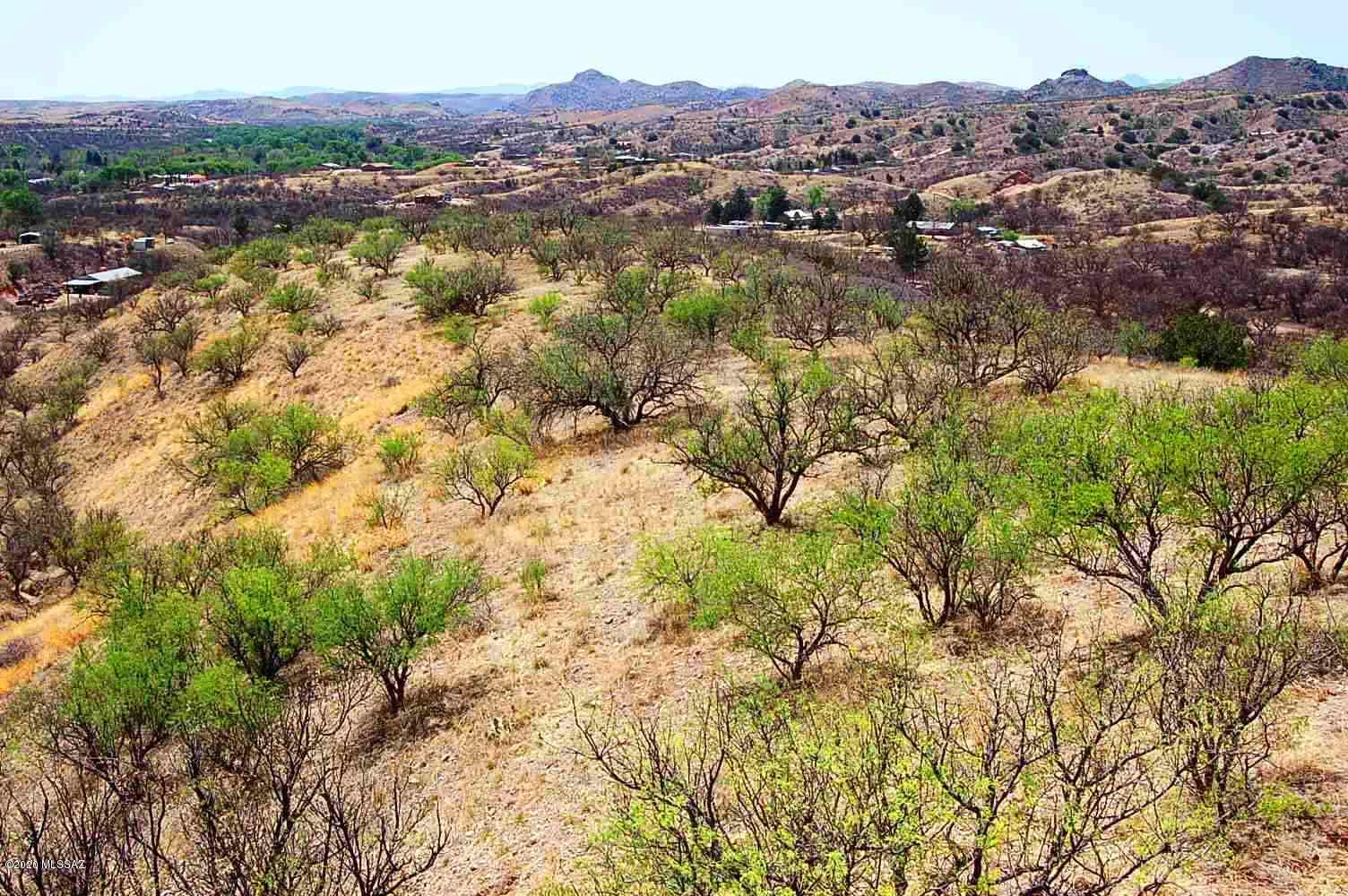 The Three Canyon Estates is an environmentally thoughtful development design in the heart of Southern Arizona's Sky Islands.  Recognized by the National Association of Counties for best practices in sustainable  projects and programs, the development was designed to protect the land and wildlife, while providing an exceptional community lifestyle for residents.  This very special parcel within Three Canyons is beautifully set for incomparable mountain views of the Santa Ritas, Patagonias & Canelo Hills.  Each lot has described building envelopes. Land outside the envelope remains in conservation easement.  If you are longing for tranquility, moderate temperatures, nearby recreational activities, & spectacular star filled night skies