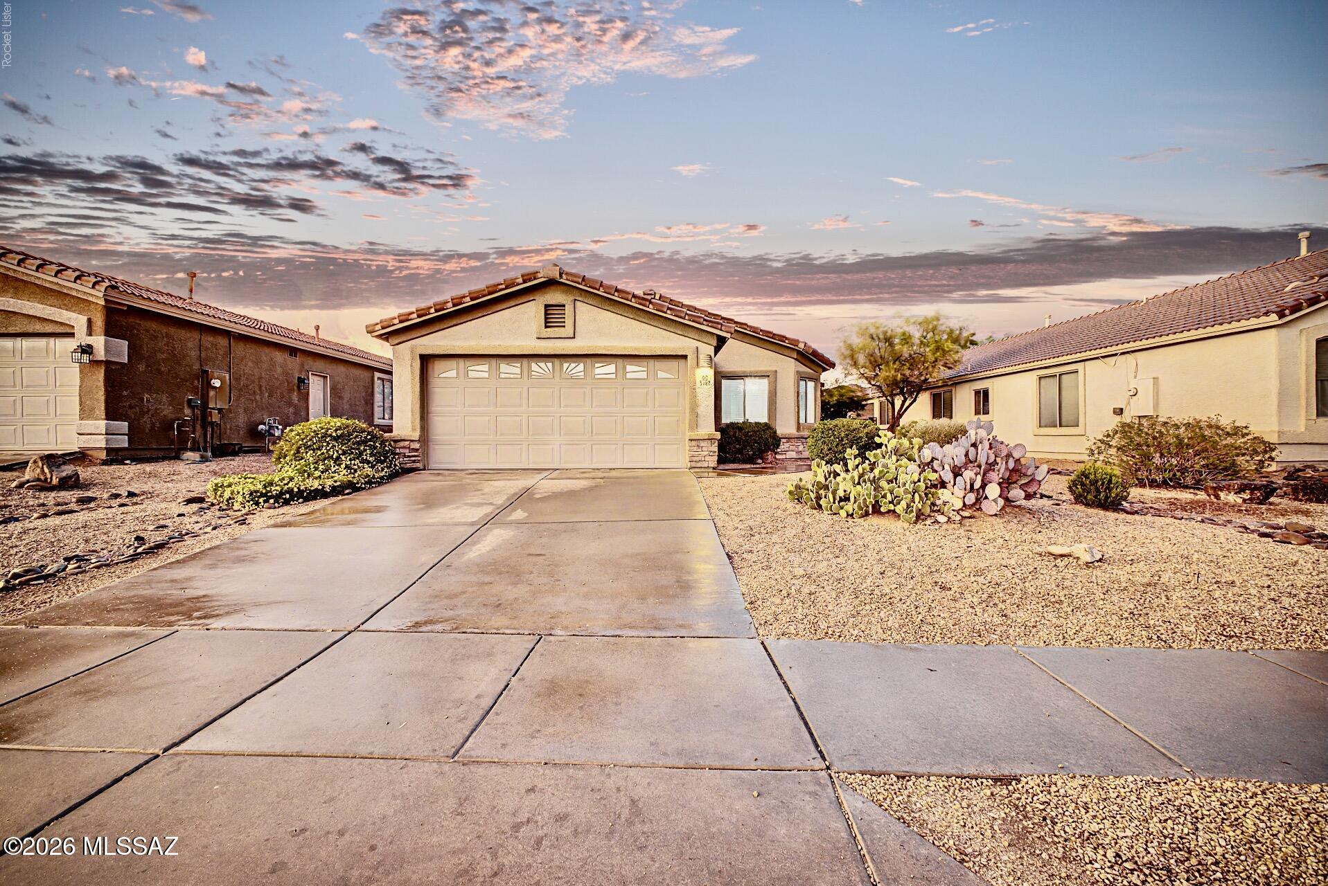 Welcome to this beautiful 3BR, 2BA home in the highly desirable Dove Mountain community. Located in the early part of Dove Mountain near Tangerine Road, this home offers convenient access to shopping, dining, golf, and everyday amenities. Situated across from a community park featuring tennis courts, basketball courts, greenbelts, and open play areas, this former model home features a roof replaced in May 2026, an attractive kitchen, vaulted ceilings, and an open-concept floor plan ideal for everyday living and entertaining. The backyard features a refreshing SWIMMING POOL, perfect for enjoying Arizona's beautiful weather. Combining location, quality, and lifestyle, this home is a wonderful opportunity to enjoy all that Dove Mountain has to offer.