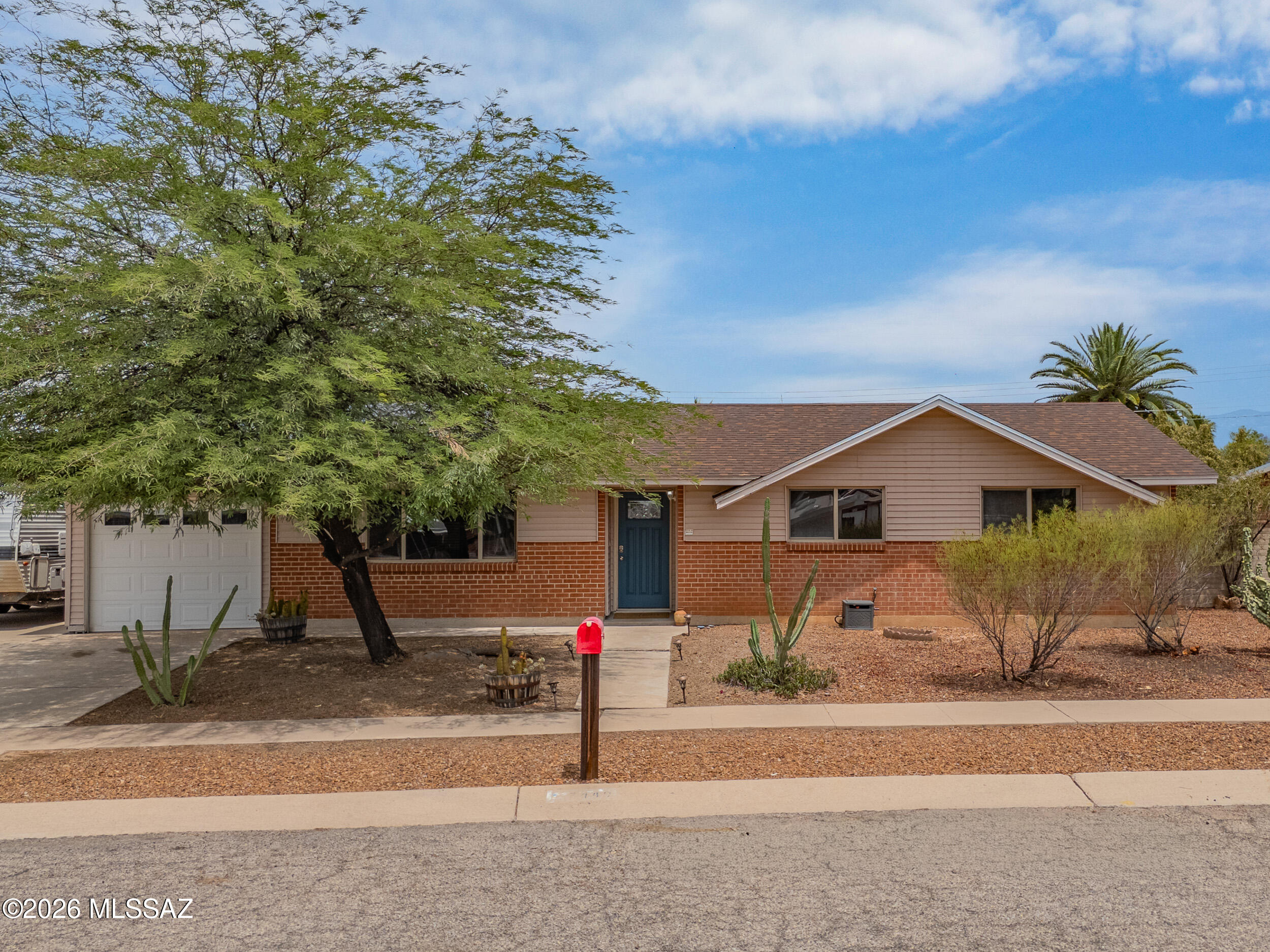 Welcome to 7449 East 18th Street - a beautifully updated 3-bedroom, 2-bath home offering 1,234 square feet of comfortable living space in a convenient Tucson location. This move-in ready home features updated flooring and refreshed cabinetry, creating a modern and inviting feel throughout. The thoughtfully designed floor plan offers comfortable living spaces perfect for everyday living and entertaining. Step outside to a beautifully landscaped, low-maintenance backyard--ideal for relaxing, hosting gatherings, or simply enjoying Arizona's beautiful weather without the upkeep. This property offers the perfect blend of comfort, style, and convenience. Don't miss this fantastic opportunity to own a beautifully updated home in Tucson!