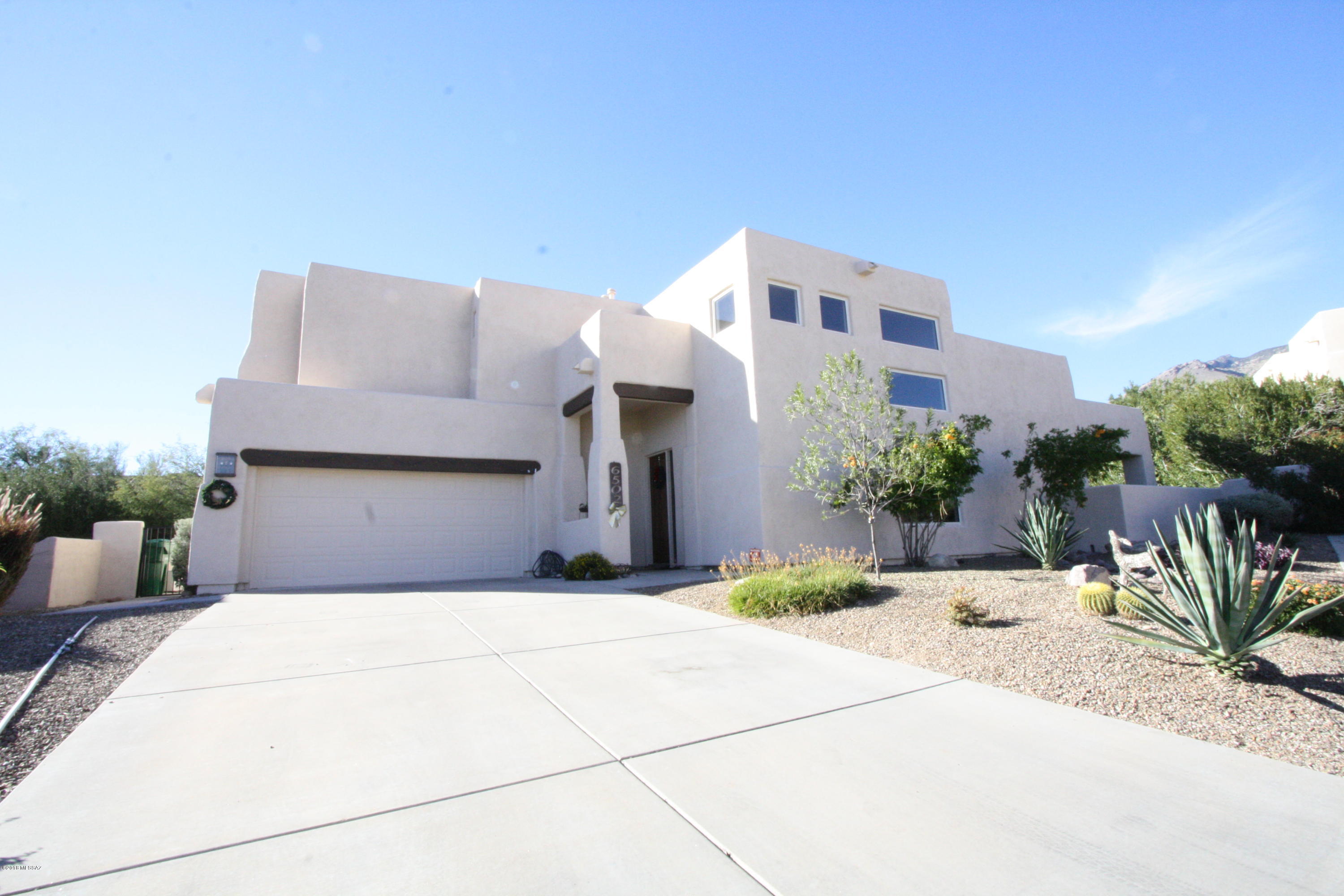 Beautiful 4bdr/3ba home in Westgate at Ventana minutes to Sabino Mountain, shopping and more!
Spacious Living Room w/Fireplace, Family Room w/Fireplace, Gourmet kitchen w/Stainless Steel appliances and granite counters.
Fabulous Satillo floors, staircase w/custom wrought iron railing.
Bedroom/Den and full bath downstairs.
Backyard features covered patio and sparkling pool.  (No large pet dogs) Tenant occupied until 06/30/2026
