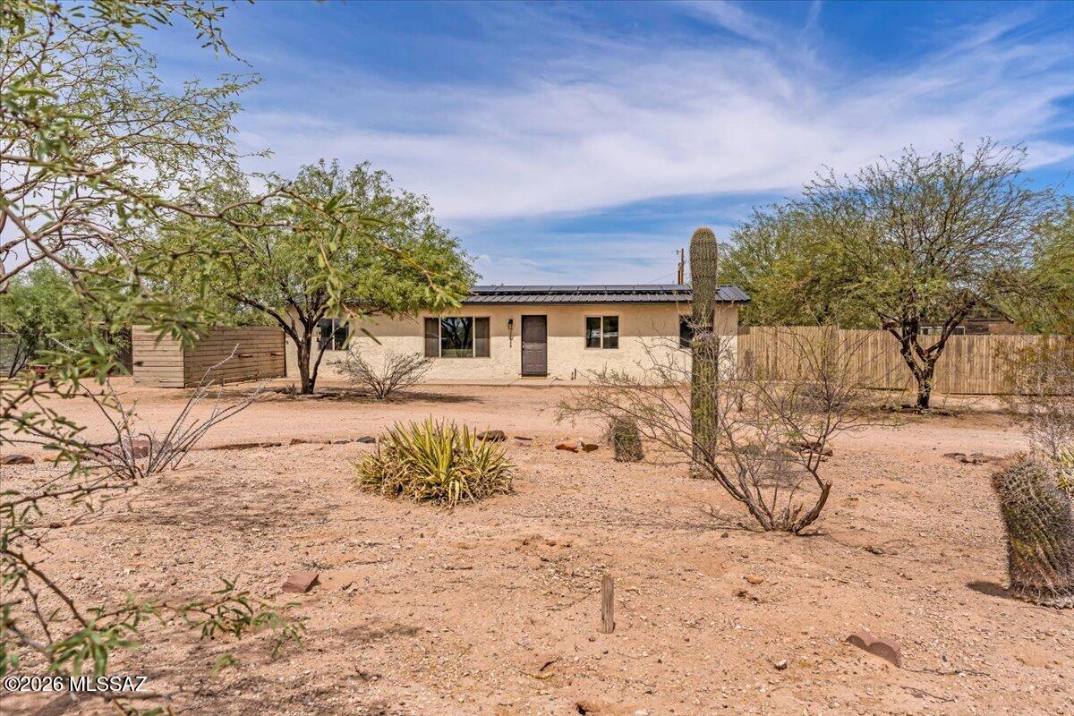 Welcome to your own slice of country paradise! Renovated in 2021, this property combines modern updates with the freedom and functionality you've been searching for. Major improvements include a new A/C system (2024), new septic leach field (2024), owned solar with a new electrical panel, providing comfort and energy efficiency for years to come. The property is thoughtfully equipped for a variety of uses, featuring a second electrical pedestal and separate septic system in the rear of the property, perfect for a future tiny home, guest quarters or RV setup. Outdoor enthusiasts, hobby farmers, and gardeners will love the impressive amenities, including a barn with electricity, greenhouse, chicken coop,  that offer endless possibilities for storage, livestock, workshops, or hobbies. A new covered patio creates the perfect space to relax, entertain, and enjoy Arizona's stunning sunsets.
Whether you're dreaming of a small homestead, space for animals, room for recreational vehicles, or simply a peaceful property with valuable infrastructure already in place, this unique Marana property offers incredible flexibility and opportunity.