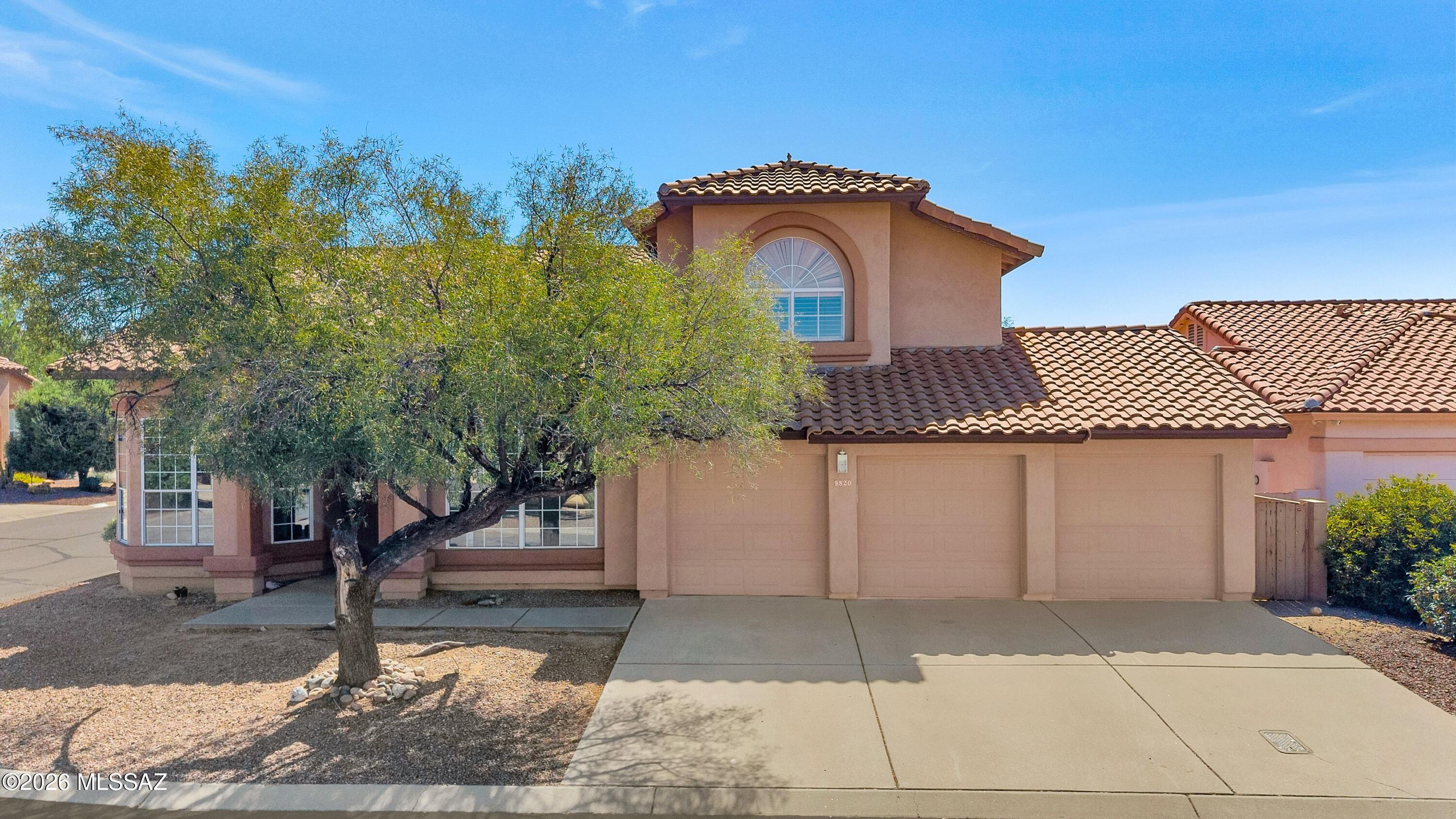 This remarkable 3194 sq ft, two-story home sits on a generous quarter-acre lot with a breathtaking backyard. The outdoor space is expansive and beautifully landscaped, perfect for relaxation and entertaining, complemented by a sparkling pool and spa. Inside, the primary suite is conveniently located on the lower level, with soaring ceilings enhancing the sense of space. A large workshop offers potential conversion into a casita, adding even more versatility. Plus, a three-car garage rounds out the features. Situated on a corner lot, you'll enjoy stunning mountain views. Home has been freshly painted and No Poly Pipes!   Don't miss this exceptional opportunity!