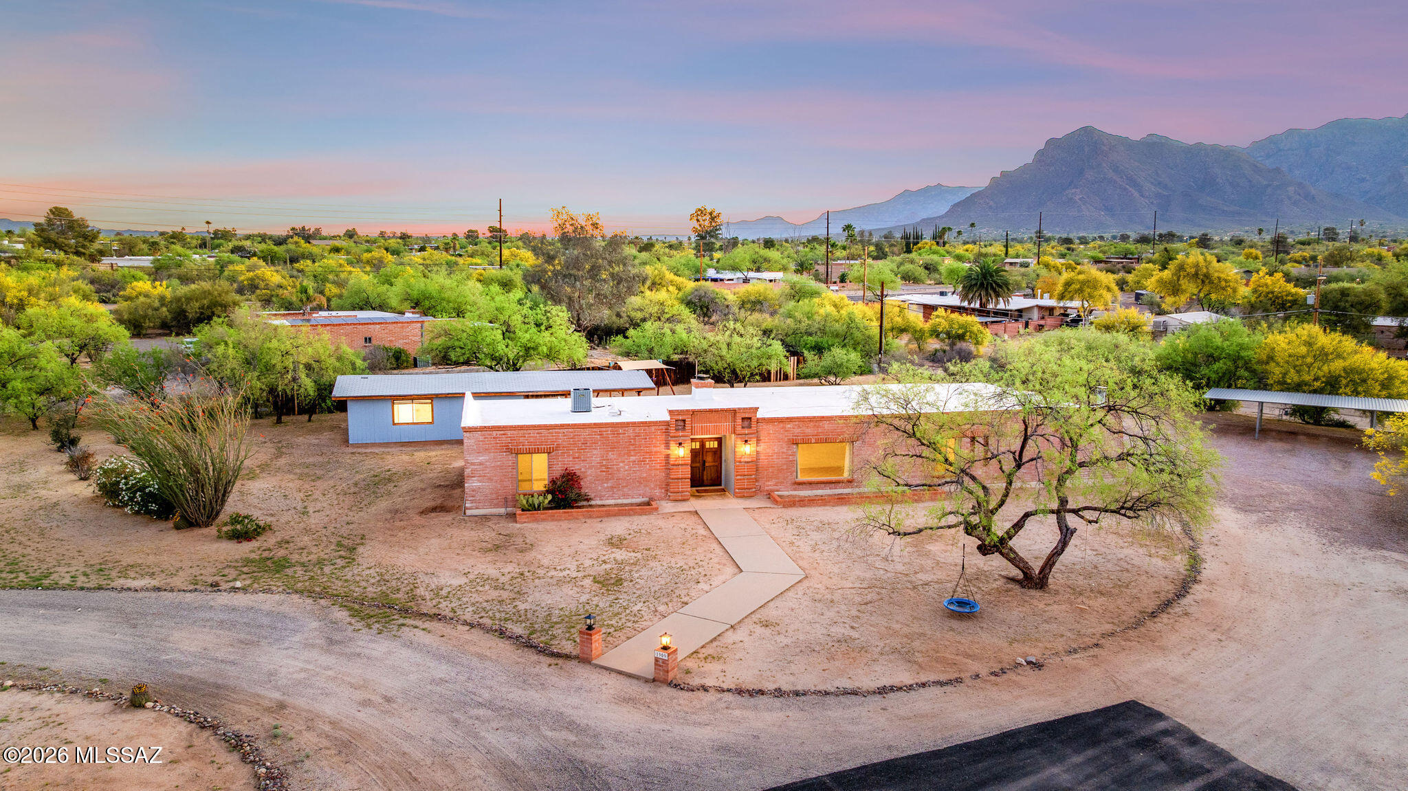 Located in the highly sought-after Casas Adobes community, this striking masonry residence blends timeless construction with modern livability, offering a lifestyle defined by space, privacy, and connection to the Sonoran Desert!
Set on a quiet cul-de-sac, the home stands proud on a generous homesite backing to a natural wash creating a rare sense of openness and direct access to scenic walking paths, desert wildlife, and unforgettable Arizona sunsets!
Inside, a thoughtfully designed split-floor plan delivers both comfort and flexibility. The open-concept kitchen anchors the home, seamlessly connecting to expansive living spaces ideal for entertaining or relaxed everyday living. The updated primary suite serves as a refined retreat, while the overall layout lives effortlessly as a five bedroom, three-bath residence.
Adding exceptional versatility, a separate casita suite with its own kitchenette offers the perfect solution for guests, multigenerational living, or private workspace. For those who value creativity and functionality, the oversized workshop/garage provides ample room for woodworking, hobbies, or projects of any kind--complemented by a spacious three-car carport.
Step outside to a deep covered patio designed for year-round enjoyment--whether hosting gatherings or simply unwinding in the peaceful desert surroundings.
All of this is complemented by an unbeatable location just minutes from the vibrant Ina & Oracle corridor--featuring Whole Foods Market, Wildflower, Village Bakehouse, boutique shopping, and the botanical beauty of Tohono Chul Park!
A rare blend of character, versatility, and location--this is Casas Adobes living at its finest.