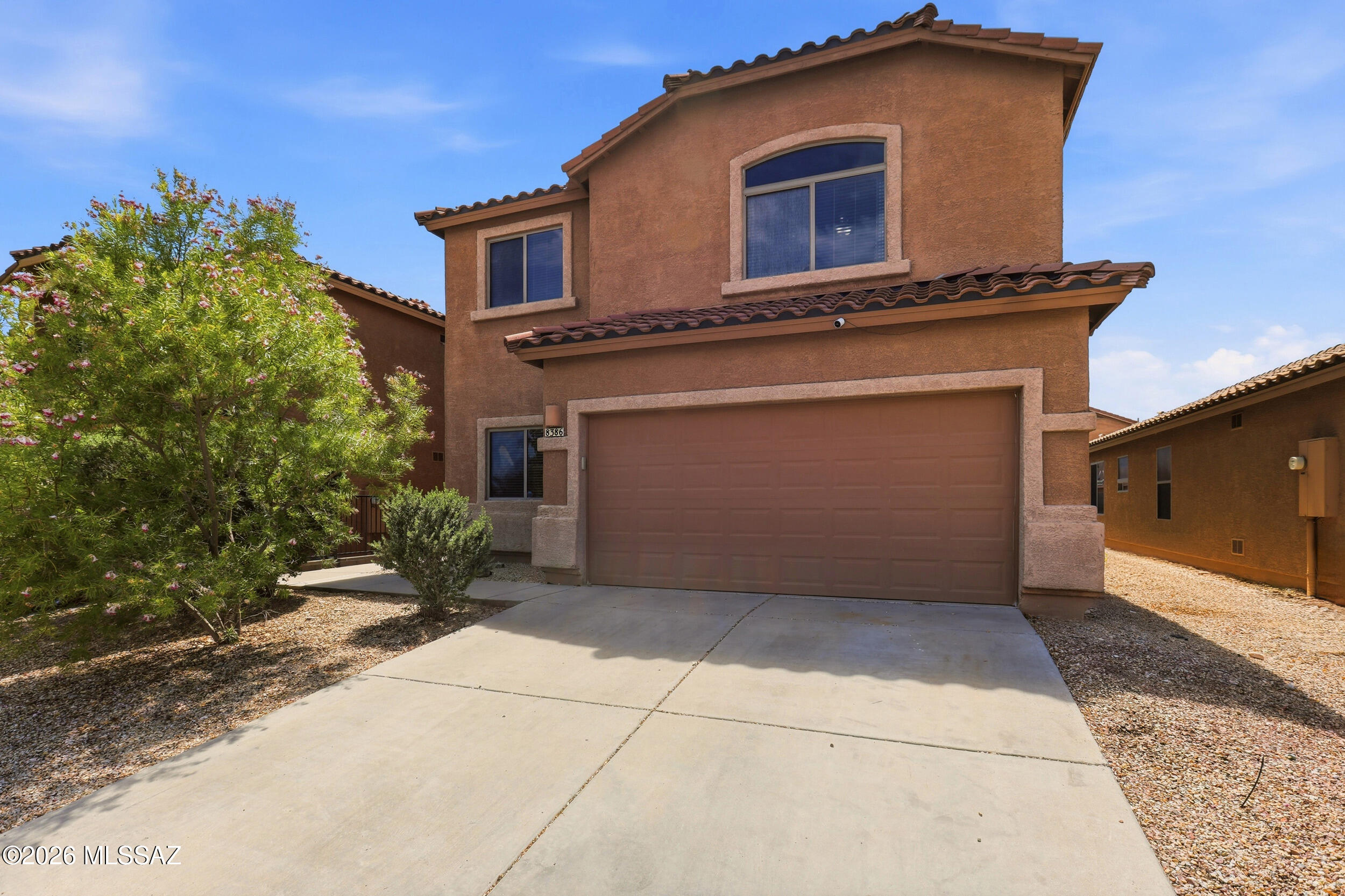 This spacious two-story home offers 2,199 sq. ft. with 4 bedrooms, 3 bathrooms, and a flexible front room perfect for a playroom or home office. Enjoy a beautifully landscaped backyard and access to a neighborhood pool. Conveniently located near Fry's, shopping, dining, and top-rated Vail schools, this home is ready to welcome you! Also, this home has a 2.75% assumable VA loan.