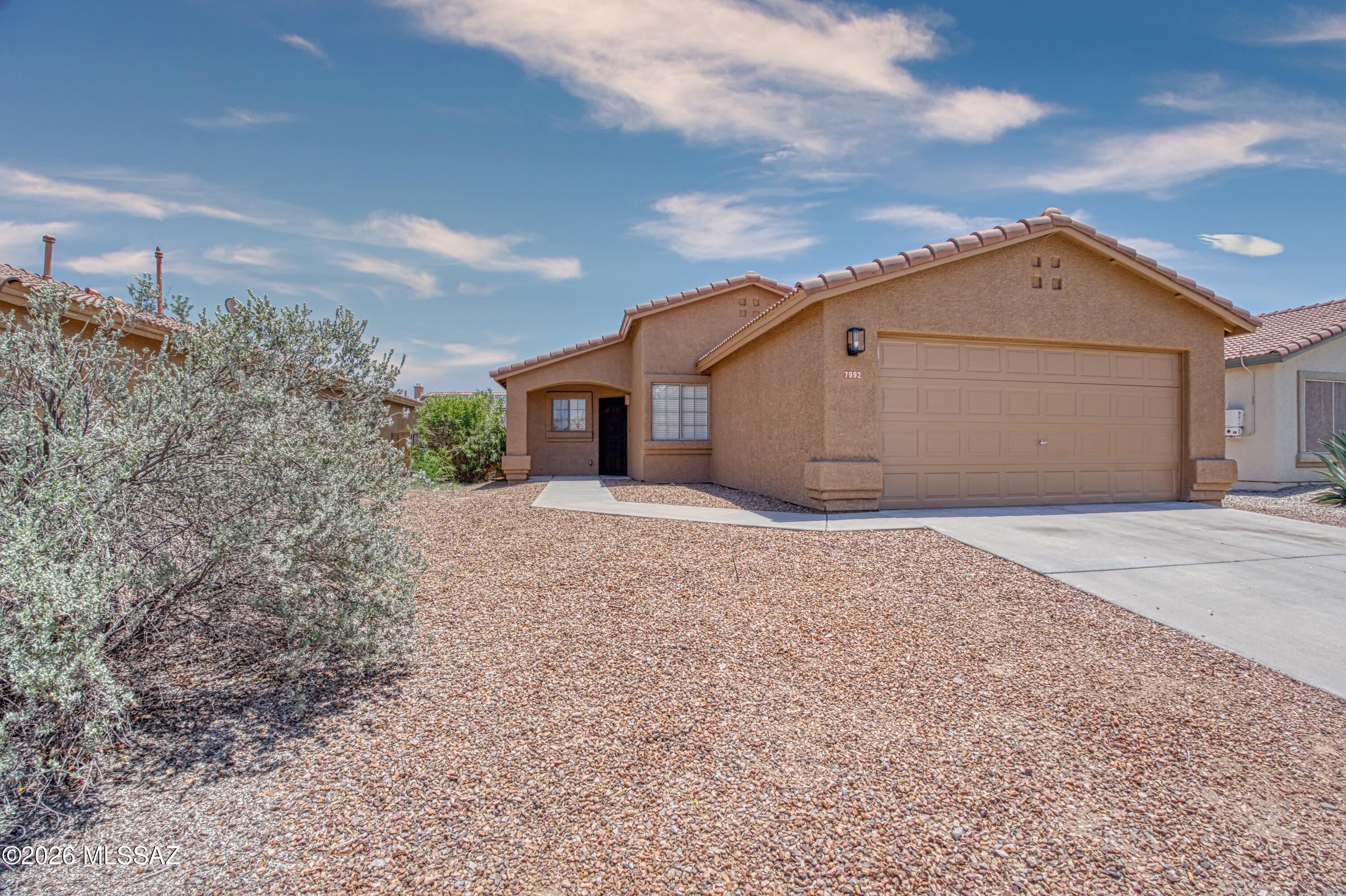 Welcome home to this move-in ready Continental Ranch property featuring 3 bedrooms, 2 baths, a desirable split-bedroom floor plan, and no rear neighbors for added privacy. Fresh interior and exterior paint create a clean, refreshed feel throughout. The backyard offers a covered patio and brick paver extension--ideal for relaxing, entertaining, or enjoying Arizona evenings. Conveniently located near neighborhood parks and community amenities, this home is ready for its next owner to enjoy.