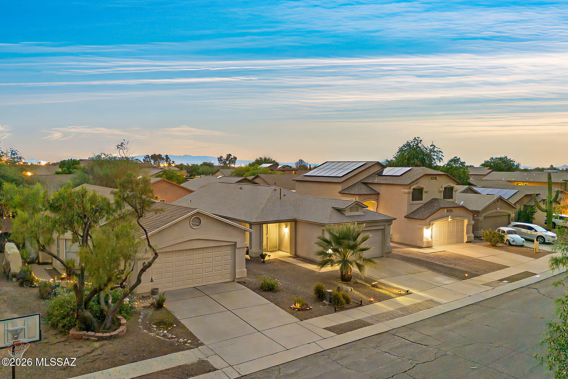 Welcome to desirable Rita Ranch! All of the work & updates have been done for you in this pristine, Move-In Ready, contemporary bungalow. 3 bedrooms & 2 baths Featuring updated interior 2-tone paint, tile flooring, gorgeous updated kitchen & baths with beautifully upgraded cabinetry and granite countertops throughout! Breakfast bar seating, & stainless appliance package included. Reverse Osmosis at all sinks! Beautiful Primary suite with fabulous custom walk in closet system. Additional upgrades completed for you include newer shingle roof, water softener, On Demand tankless hot water system, coated garage flooring, beautifully manicured backyard with extended paver patio, pergola, and just enough turf.  Don't wait! Call to schedule your private showing today