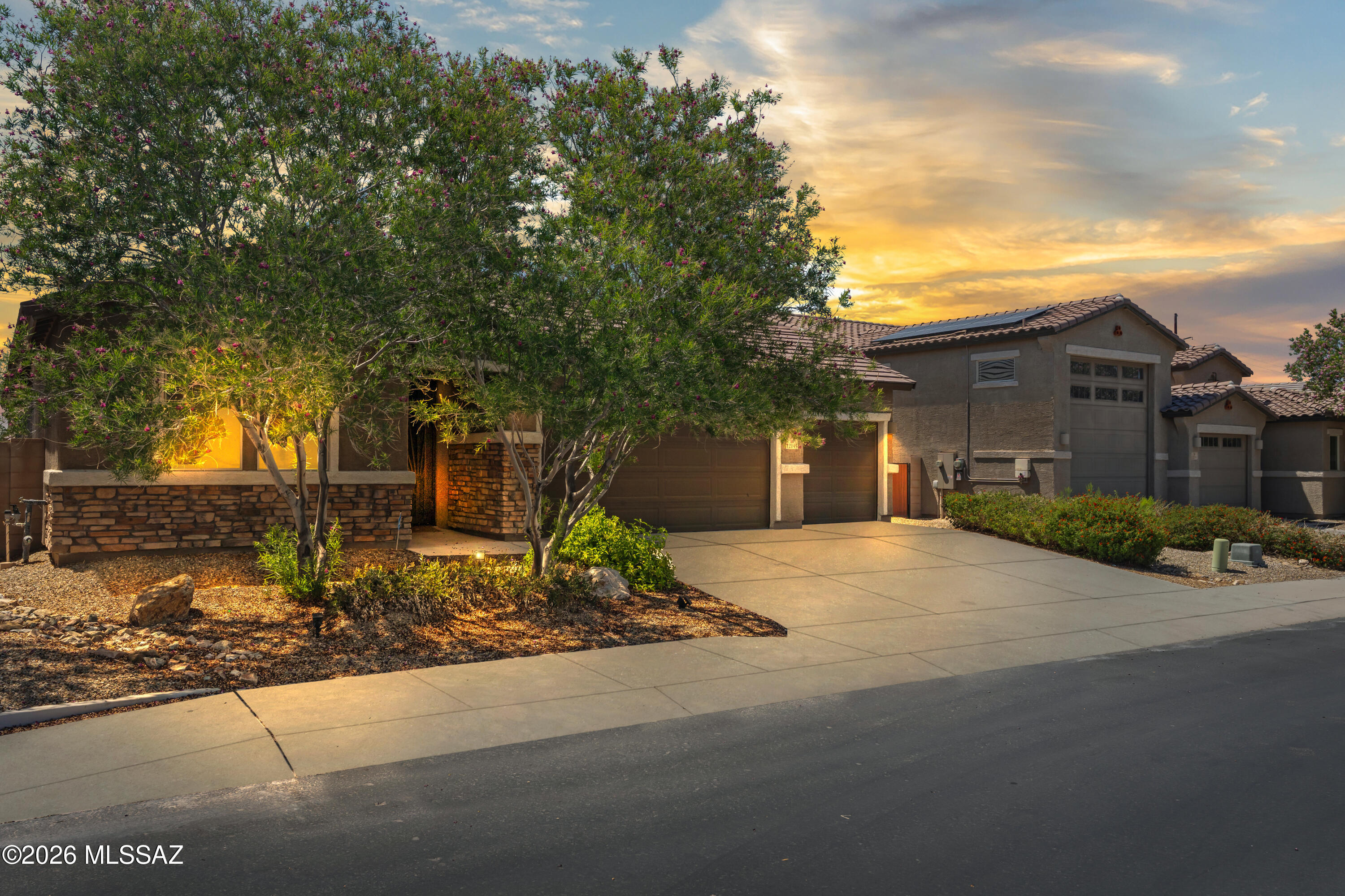 OWNED SOLAR!!! Beautifully upgraded 2020 Richmond American semi-custom home in sought-after Gladden Farms offering 2,223 sqft, 3 bedrooms, 2 baths, plus a versatile den/office. Features include an upgraded kitchen with granite countertops, oversized island, stainless steel appliances, and premium finishes throughout. Energy-efficient owned solar with battery backup, 3-car garage, covered patio, and low-maintenance backyard complete the package. Located near parks, walking paths, schools, and community amenities in one of Marana's most desirable neighborhoods.