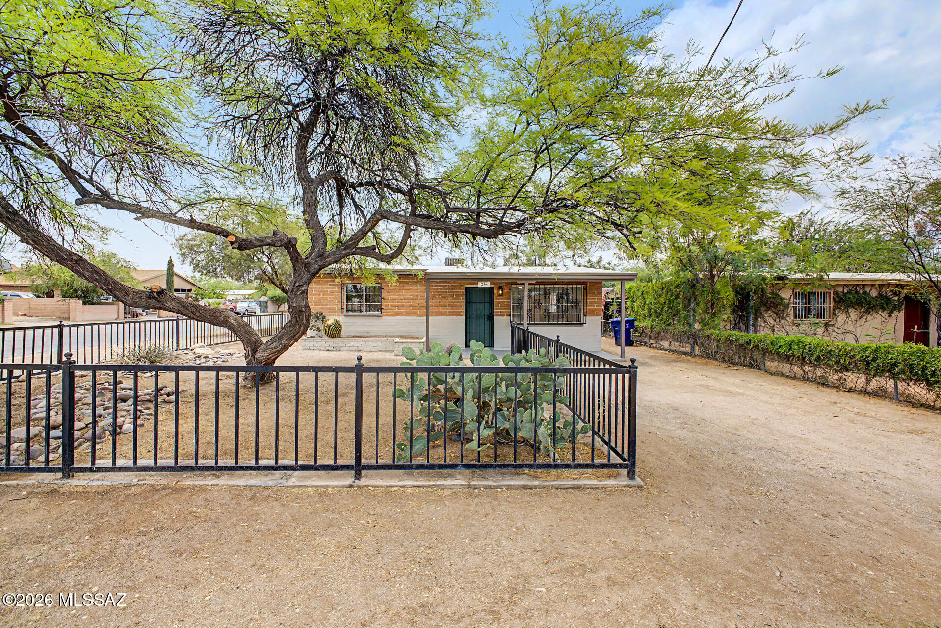 Now available!  Updated home in South Tucson. Beautiful features include modern electrical & plumbing fixtures, fresh interior & exterior paint, stainless steel appliances, new countertops, neutral brown cabinets and earth tone backsplash. Bathroom updated with Pedestal Sink, tile shower surrounds and fixtures. Large backyard and extended covered patio with lots of possibilities.  A must see!