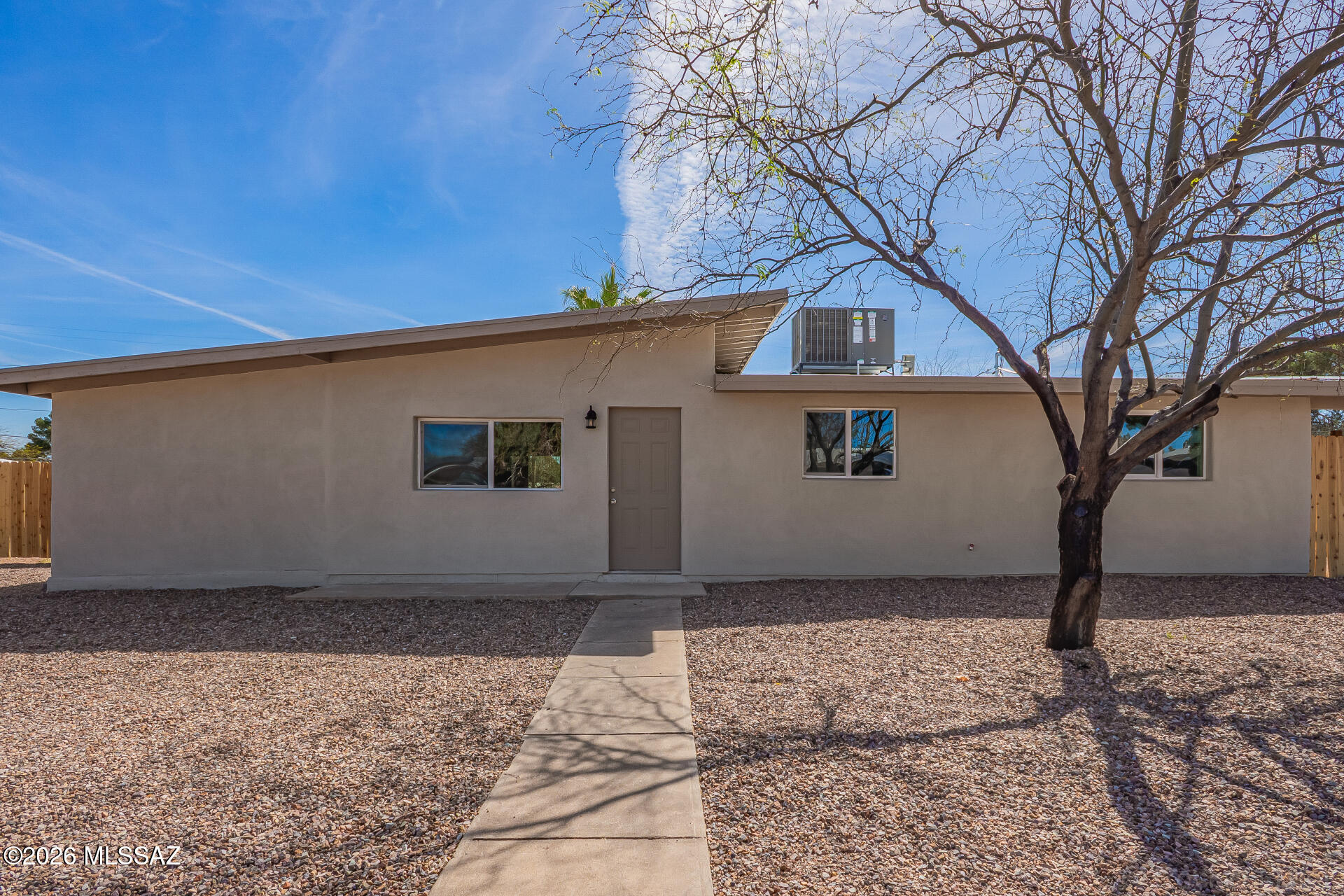 This recently renovated 4-bedroom, 2-bath residence is the one you've been searching for! You'll be delighted by the updated interior showcasing an open layout with vaulted ceilings, a soothing palette, recessed lighting, and attractive wood-look flooring. The updated kitchen includes white shaker cabinets for storing culinary essentials. You'll also find a versatile bonus room, perfect for a hobby room or an office. The primary bedroom showcases soft carpeting and a private bathroom for added comfort. Imagine peaceful afternoons in the sizeable backyard, featuring a covered patio, breathtaking mountain views, and abundant space for crafting your dream outdoor oasis. Don't miss out on this fantastic opportunity! Agent/Owner