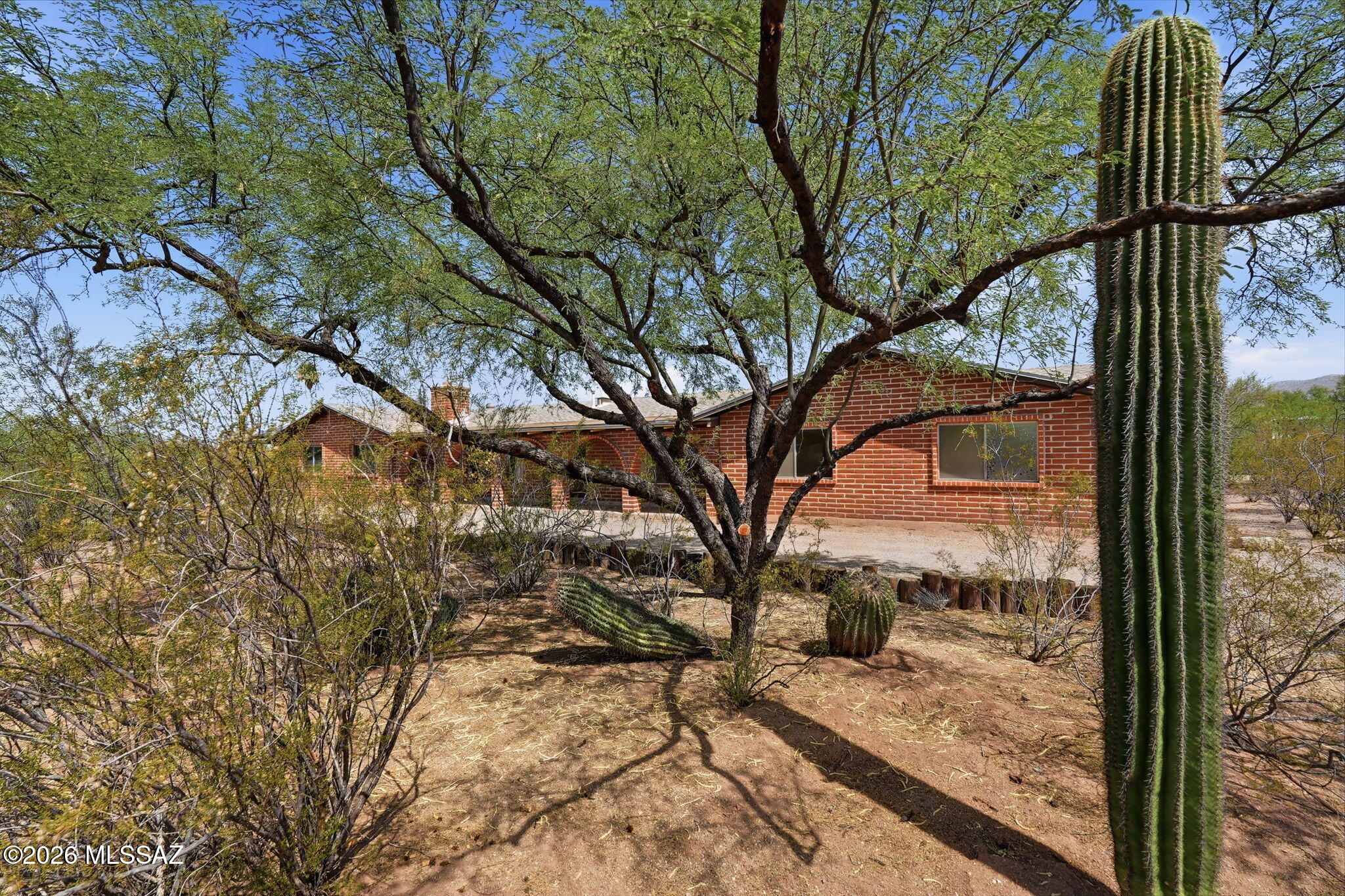 Discover the perfect blend of privacy, comfort, and Arizona living at 11435 E Sundnce Dr. Set on a spacious homesite with Catalina Mountain views, this home offers the tranquility of the Sonoran Desert just minutes from shopping, dinding, and everyday conveniences The open floor plan is ready for your personal updates and style. Standout features include a 7KW owned solar sysemn with 8 batteries, an incredible 6-car garage/workshop with 220V power and air compressor, plus a 50-amp RV hookup. The private backyard is ideal for relaxing or entertaining. A rare opportunity combining energy efficiency, exceptional workspace, privacy and endless potential.