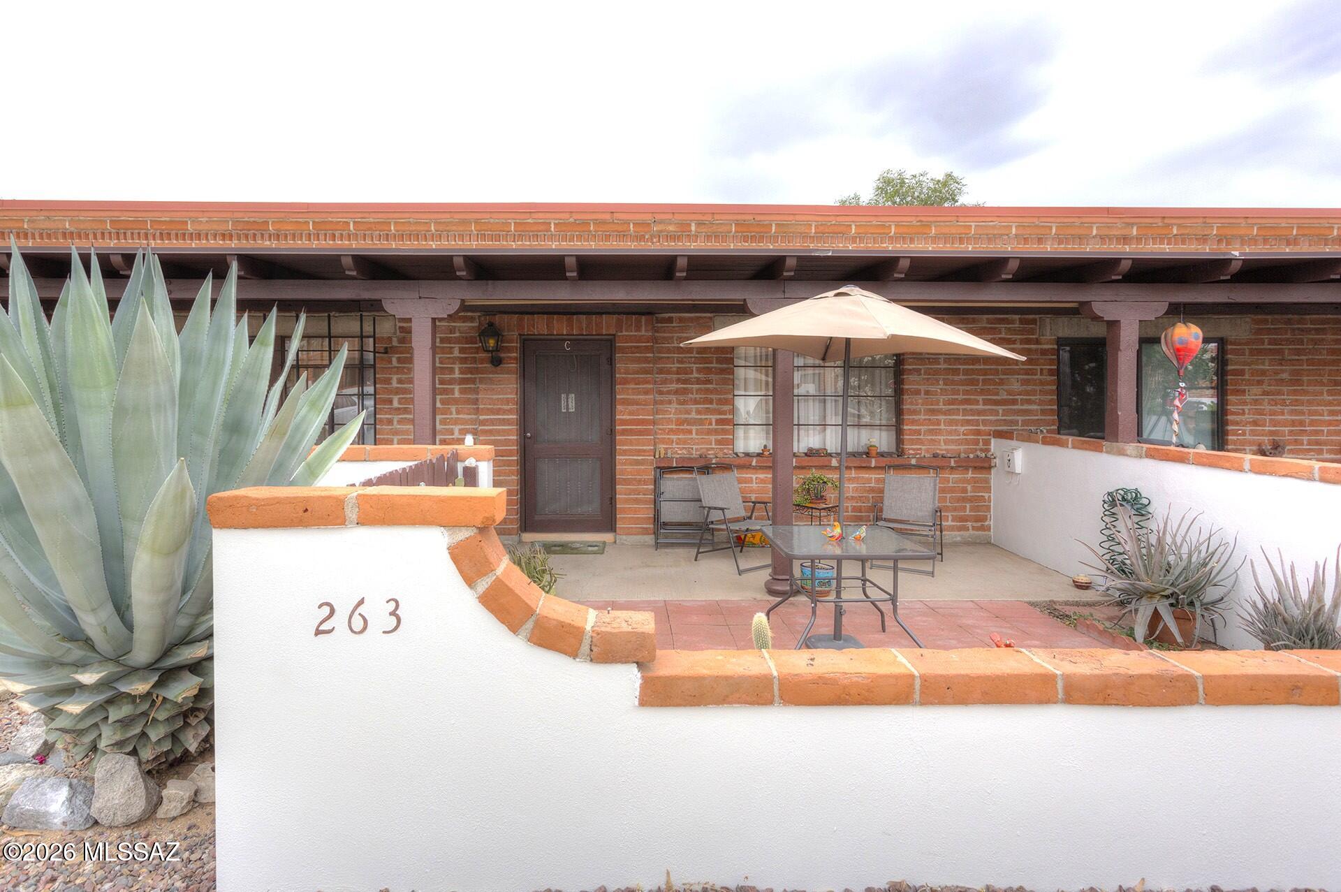 WOW!  Enjoy easy living in this sunny 1 BR, 1 BA Villa, featuring updates throughout.  The kitchen has newer cabinets, while alL flooring adds easy care.  The bath has been updated with a walk-in shower with glass doors--easy in and out!  Convenience is key to this Villa with assigned parking right out front, plus it's a prime location, within walking distance to shops and restaurants.  You can also take advantage of a nearby community pool.  Another savings for this Villa is the fact that it does NOT have Green Valley Rec. membership.  That's a great savings, and if you want it later, you can add it.  Whether you're looking for a winter retreat or a  year-round home, this well-maintained Villa offers the best of both worlds.  Many to choose from, but come choose the best one!  FURNISHED!!