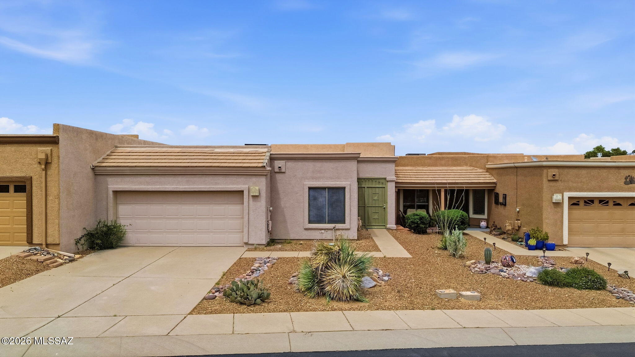 This Bright and Spacious 2-Bedroom  ( Split Plan) and 2-Bathrooms Townhome is ideal for Buyers seeking an easy Move ! The Upgraded Kitchen is both Practical and Stylish, with Granite Countertops, Stainless Appliances, Recessed Lighting and Ample Cabinets. It includes an Eat In Area . Plus a Bar Option. The Covered Patio with Pavers in the Backyard Offers a  Wonderful Mountain View. The home is close Shopping & GVR. Golf Course and Nature Trails await nearby !
Owner is a Licensed Agent in the State of Arizona