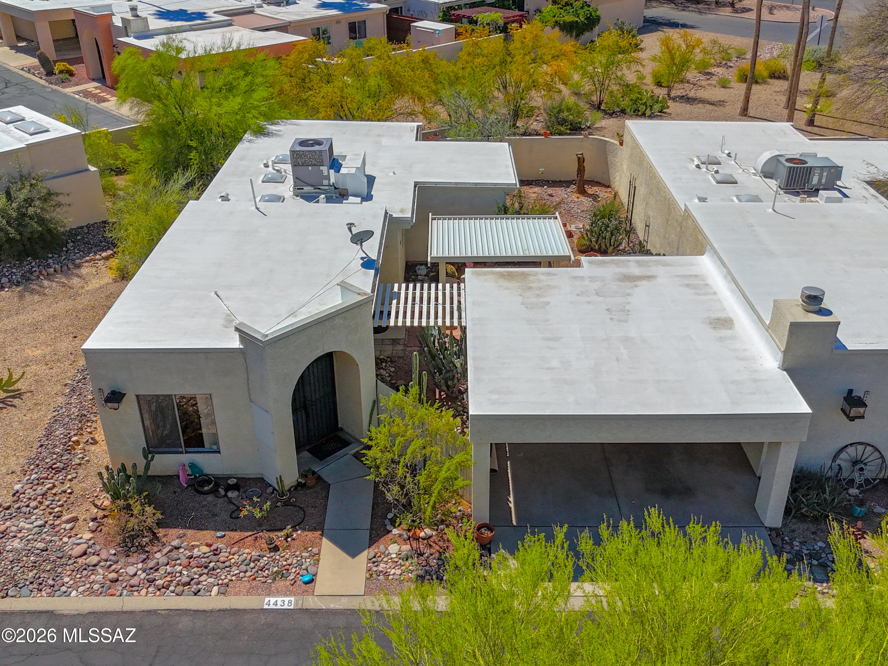 Charming 2 bed, 2 bath townhouse offering comfort and style in a convenient location. High ceilings create a bright, open living space perfect for relaxing or entertaining, while the kitchen flows seamlessly into the living and dining areas for easy living. Step outside to a private backyard with beautiful desert landscaping, ideal for peaceful mornings or sunset evenings. Enjoy stunning mountain views that enhance the home's serene feel. Close access to the River Walk offers a great biking and walking trail for active lifestyles. Just minutes from grocery stores, shopping, and everyday essentials--this home blends convenience with natural beauty. A perfect place to call home!