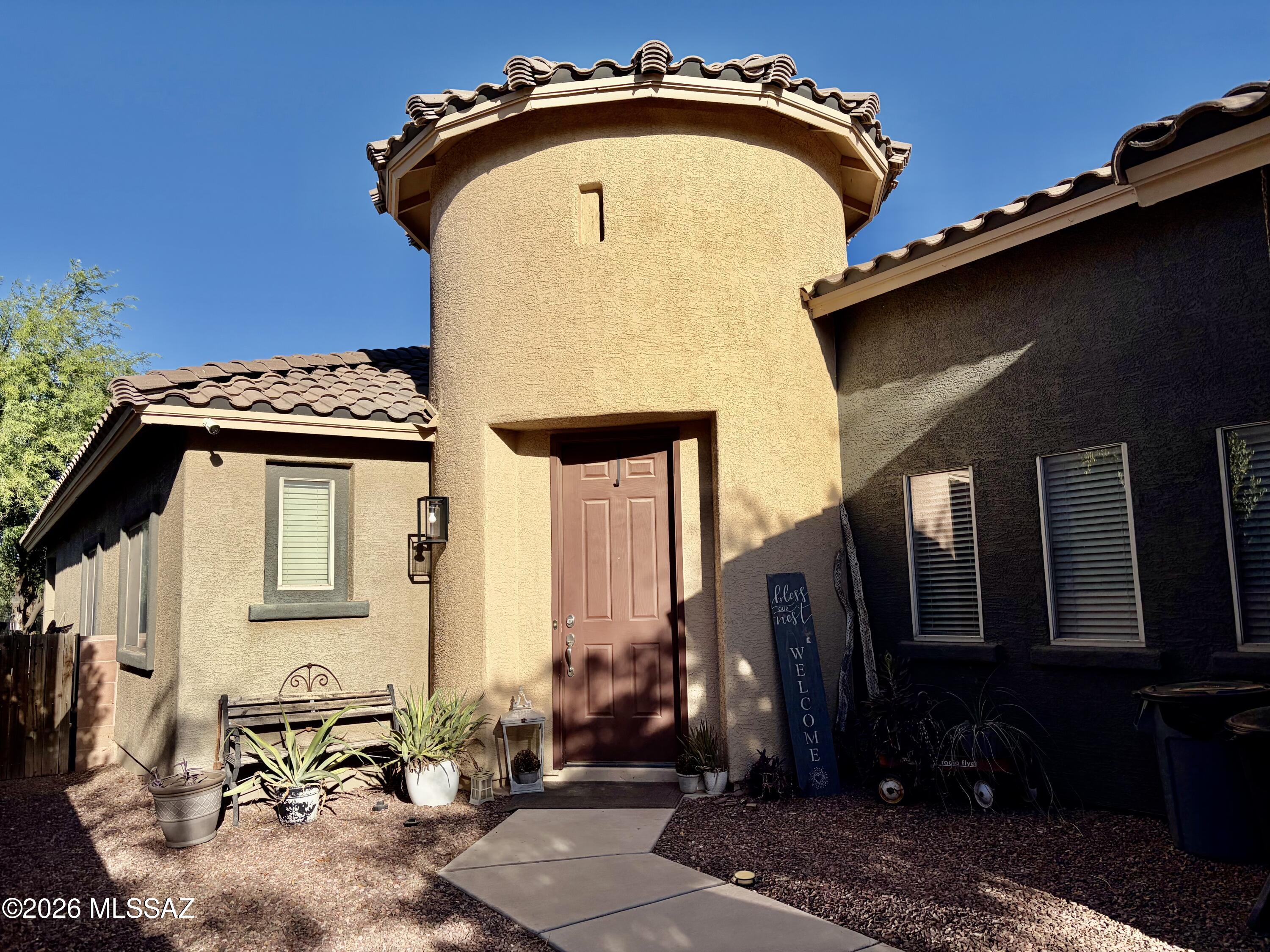 Enjoy comfortable living in this spacious 3-bedroom, 2-bath home with a versatile den in the desirable community of Marana. Backing to a peaceful natural park, this home offers privacy, beautiful views, and a relaxing setting to enjoy year-round. The large kitchen opens to a generous living area, creating the perfect space for family gatherings and entertaining. Fresh exterior paint and new flooring add to the home's appeal and move-in-ready condition. Located in a quiet, well-maintained neighborhood, this home provides a wonderful environment for families while still being conveniently close to shopping, dining, parks, schools, and other everyday amenities. Experience the perfect balance of tranquility, comfort, and convenience.
