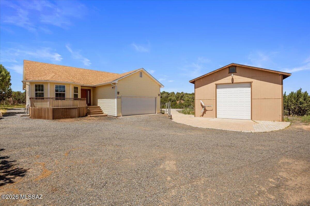 NO HOA! HUGE SHOP! Bring your RV, toys, and outdoor lifestyle to this incredible White Mountain property! This 3-bedroom, 2-bath home offers approximately 1,688 square feet of living space on just under an acre in the desirable White Mountain Lakes area of Show Low. The highlight of this property is the approximately 1,200-square-foot detached shop, providing exceptional space for RV parking, boats, side-by-sides, trailers, workshop projects, storage, or all of your outdoor gear. Whether you're a hobbyist, adventurer, or simply need extra space, this shop is a rare find.
Built in 2007, the home features an open great room floor plan, spacious kitchen with pantry, formal dining area, utility room, attached two-car garage, and a comfortable primary suite with a soaking tub. Enjoy the beauty of Arizona's White Mountains with Silver Creek just nearby. Mature
trees, panoramic views, paved road access, and plenty of room to spread out make this property an excellent choice for a full-time residence, vacation home, or mountain retreat. If you've been searching for a home with a large shop, room for your RV, and easy access to the outdoors, this is one you won't want to miss.