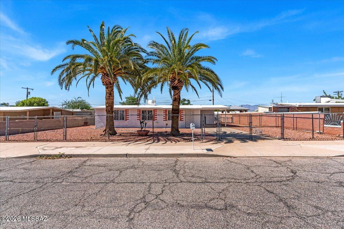 Rare opportunity to own a lovingly maintained Tucson home with only one owner since it was built in 1957. Pride of ownership shines throughout this property, which has been meticulously maintained over the decades. Recent updates include fresh exterior paint and a newly coated roof, providing added peace of mind for years to come.

Situated on a large, fully fenced lot, this property offers ample space for gardening, entertaining, RV parking, or future possibilities, all with the freedom of no HOA restrictions. Large R-2 zoned lot with no HOA offers exceptional flexibility for future expansion, an accessory dwelling unit (ADU), or other residential possibilities subject to city approval.

Located in a well-established neighborhood, you'll appreciate the sense of community, mature surroundings, and convenient access to Tucson amenities. Homes with this level of care, ownership history, and potential are increasingly hard to find. Don't miss the chance to make this timeless Tucson property your own.