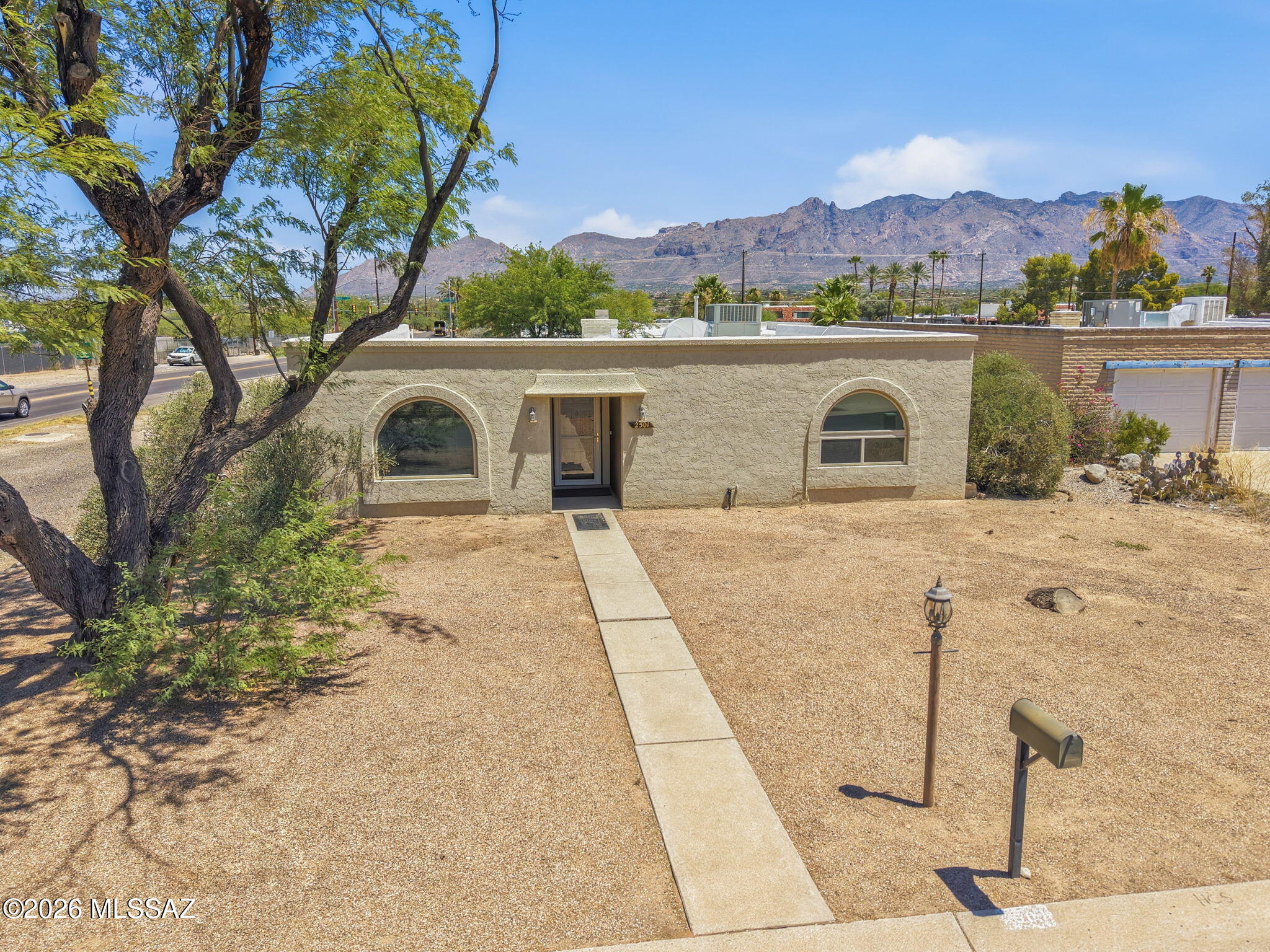 Charming home on a corner cul-de-sac lot near one of central Tucson's most desirable neighborhoods, with beautiful Catalina Mountain VIEWS. Move-in ready, this spacious home features ceramic tile throughout, generous living areas, and a functional floor plan that offers comfort today with room to add your own personal style over time. Major updates include the roof, HVAC system, water heater, and electrical panel. Located next to the sought-after Winterhaven neighborhood, without the HOA, you'll enjoy easy access to the Rillito River Park , bike path, the University of Arizona, shopping, dining, and entertainment. Come take a look and see all this home has to offer.