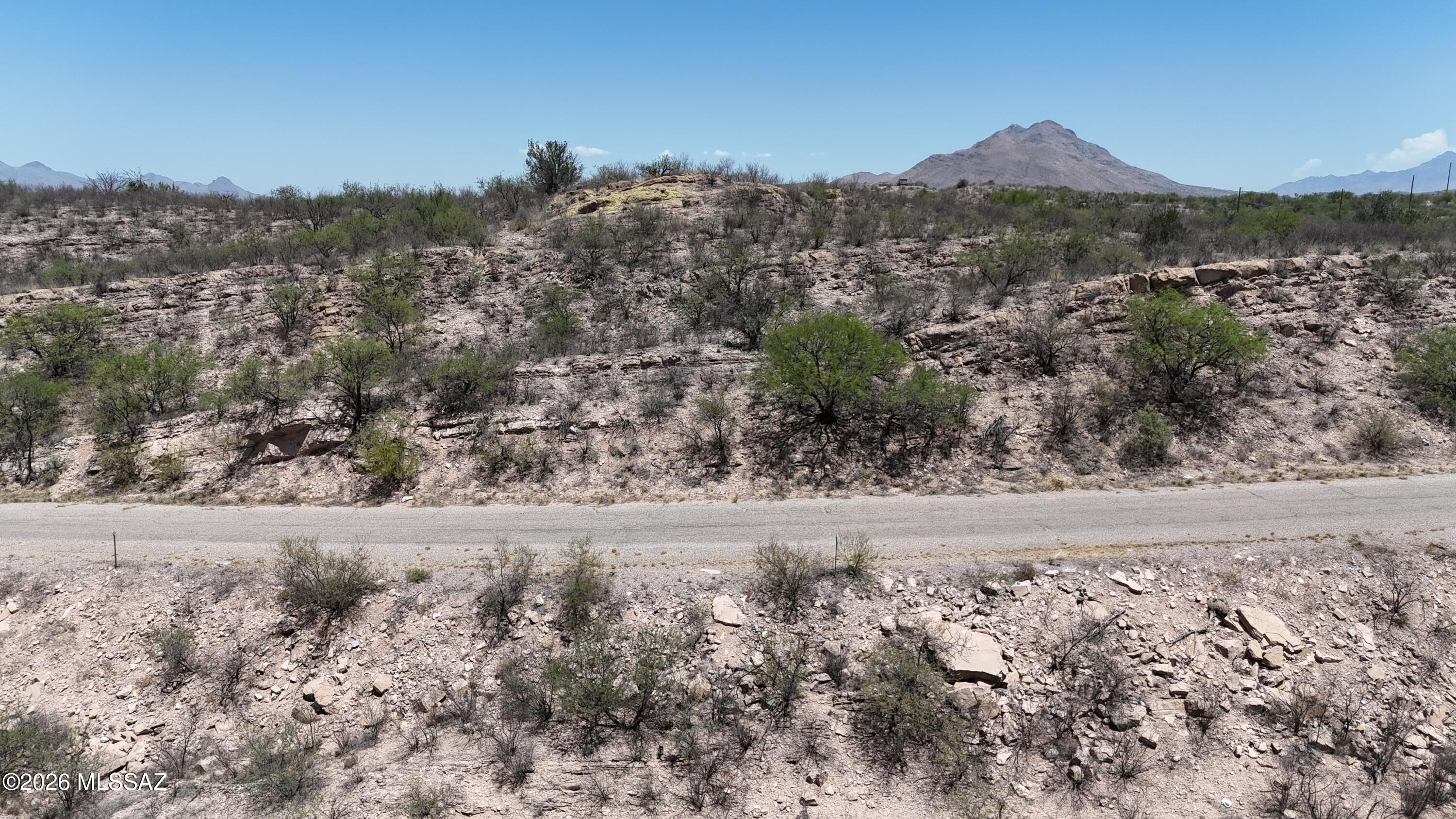 Nearly 1 acre residential lot.  Paved road.  Close to Pendleton Drive which is the main North South running road on the East side of Rio Rico.