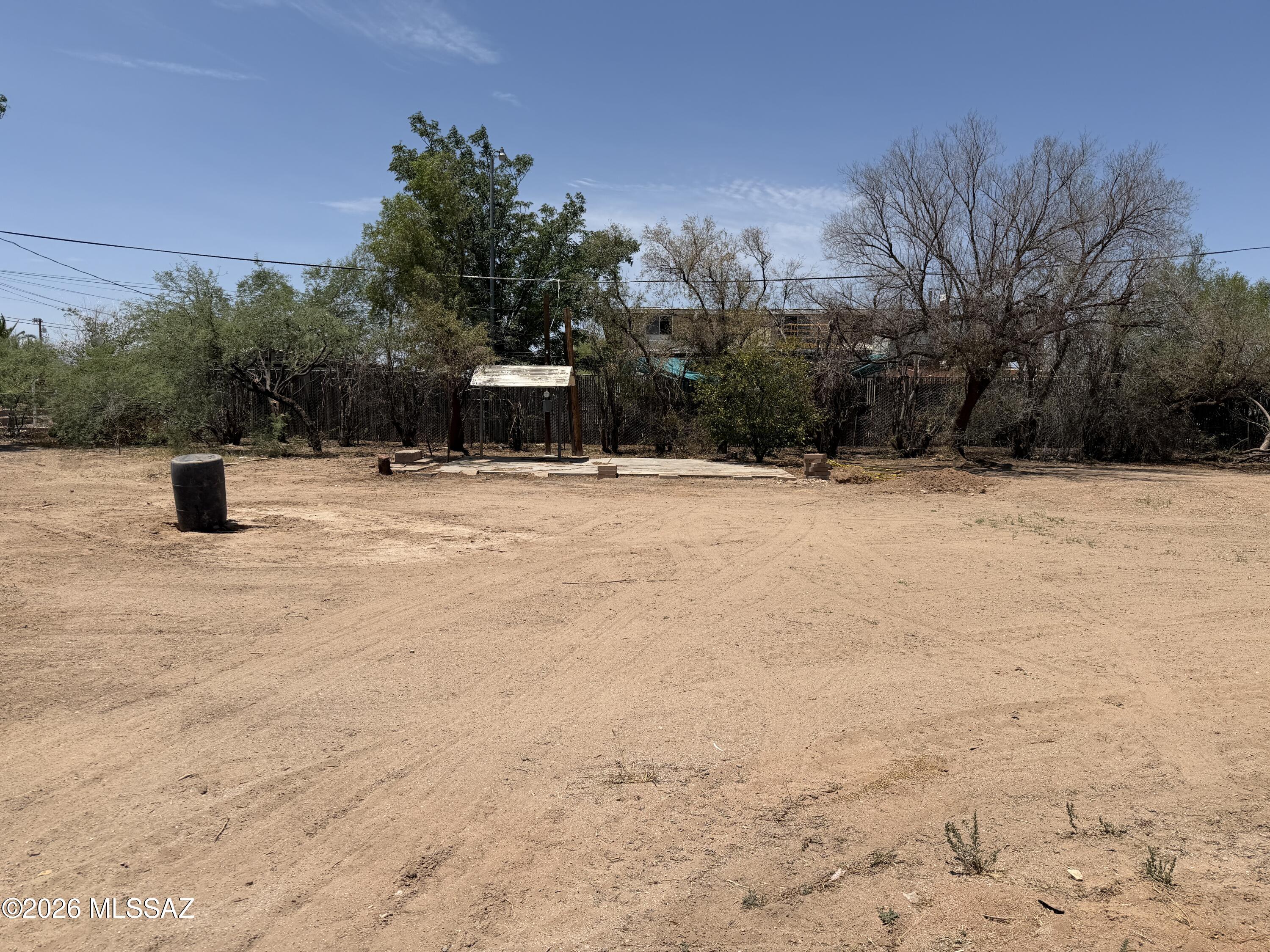 Cleared off .37 acre lot ready for your new house or manufactured home.  Water and power on site. Septic drainfield is good, just needs new septic tank. Fully fenced and flat makes this a perfect spot for your dream home or a great rental property. No HOA too!